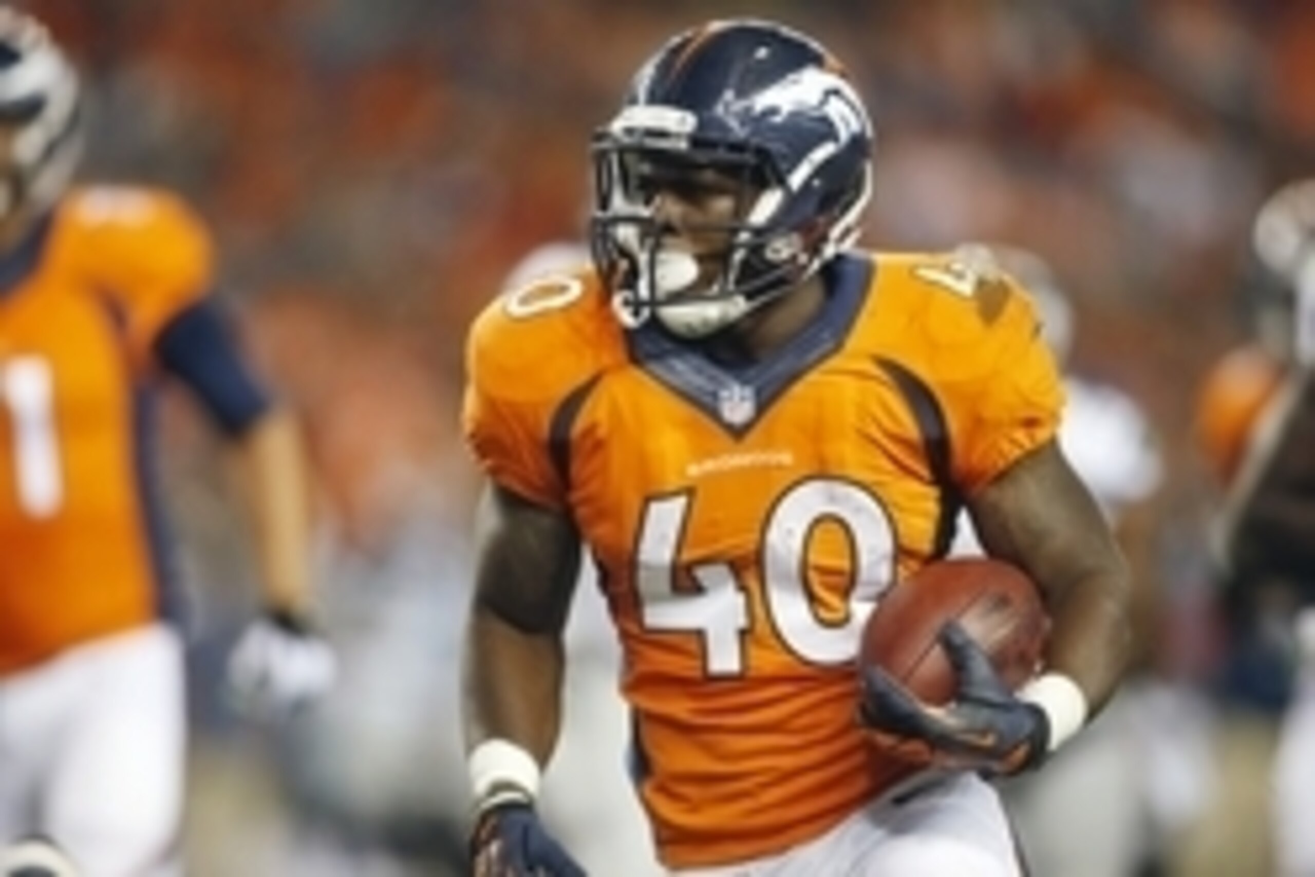 Aug 7, 2014; Denver, CO, USA; Denver Broncos running back Juwan Thompson (40) runs the ball during the second half against the Seattle Seahawks at Sports Authority Field at Mile High. The Broncos won 21-16. Mandatory Credit: Chris Humphreys-USA TODAY Spor Aug 7, 2014; Denver, CO, USA; Denver Broncos running back Juwan Thompson (40) runs the ball during the second half against the Seattle Seahawks at Sports Authority Field at Mile High. The Broncos won 21-16. Mandatory Credit: Chris Humphreys-USA TODAY Spor