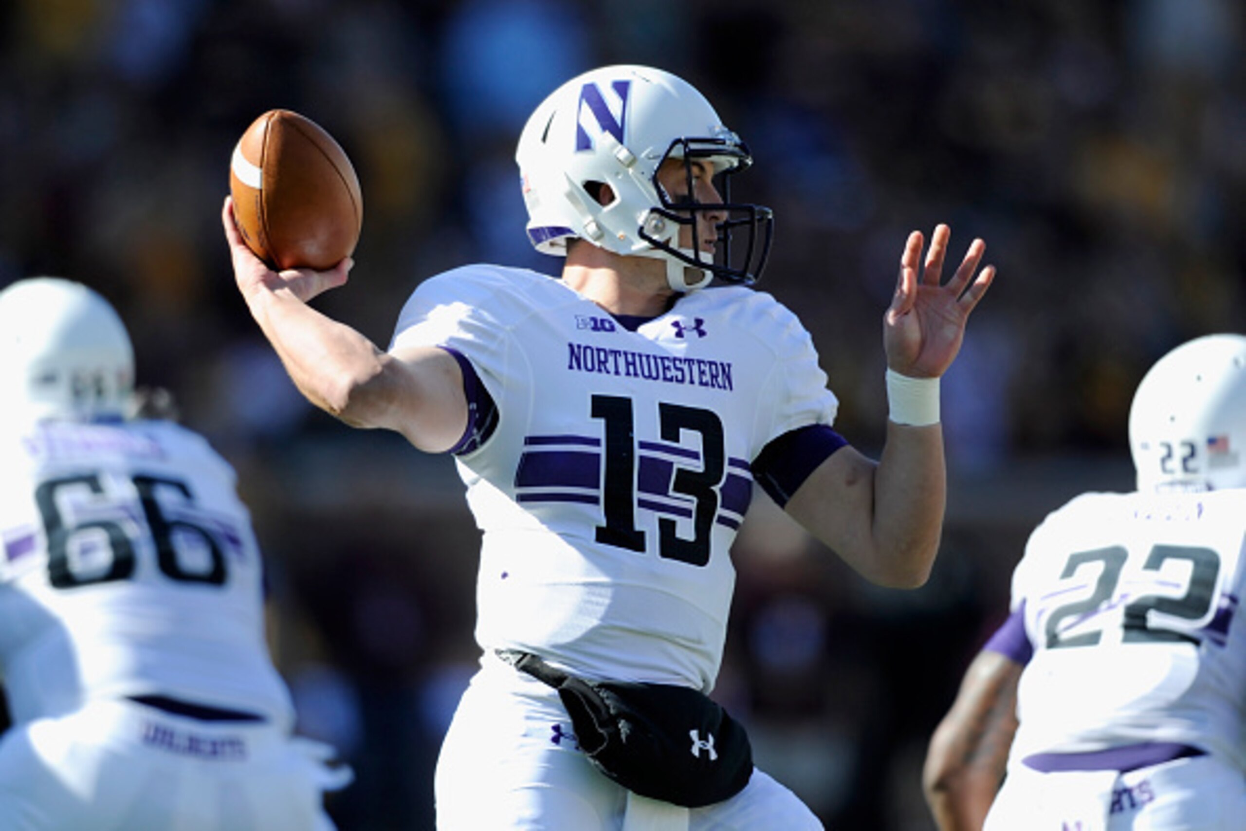 MINNEAPOLIS, MN - OCTOBER 11: Trevor Siemian #13 of the Northwestern Wildcats passes the ball during the first quarter of the game against the Minnesota Golden Gophers on October 11, 2014 at TCF Bank Stadium in Minneapolis, Minnesota. (Photo by Hannah Fos