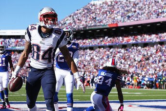 ORCHARD PARK, NY - OCTOBER 12:   Brian Tyms #84 of the New England Patriots celebrates a touchdown catch against the Buffalo Bills during the second half at Ralph Wilson Stadium on October 12, 2014 in Orchard Park, New York.  (Photo by Brett Carlsen/Getty