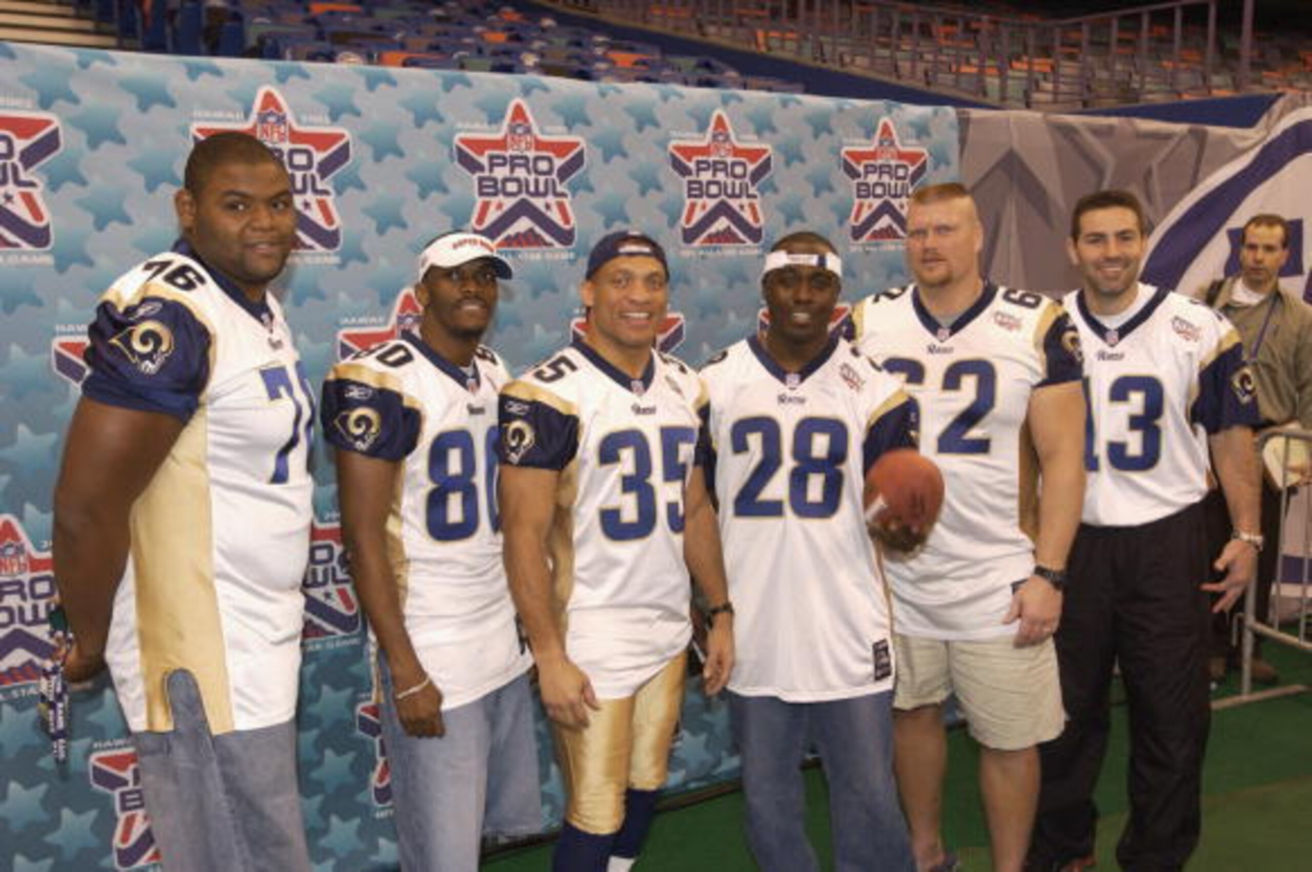 NEW ORLEANS - JANUARY 29: St. Louis Rams Pro Bowl selections (left to right) left tackle Orlando Pace #76, wide receiver Isaac Bruce #80, cornerback Aeneas Williams #35, tailback Marshall Faulk #28, right guard Adam Timmerman #62 and quarterback Kurt War NEW ORLEANS - JANUARY 29: St. Louis Rams Pro Bowl selections (left to right) left tackle Orlando Pace #76, wide receiver Isaac Bruce #80, cornerback Aeneas Williams #35, tailback Marshall Faulk #28, right guard Adam Timmerman #62 and quarterback Kurt War