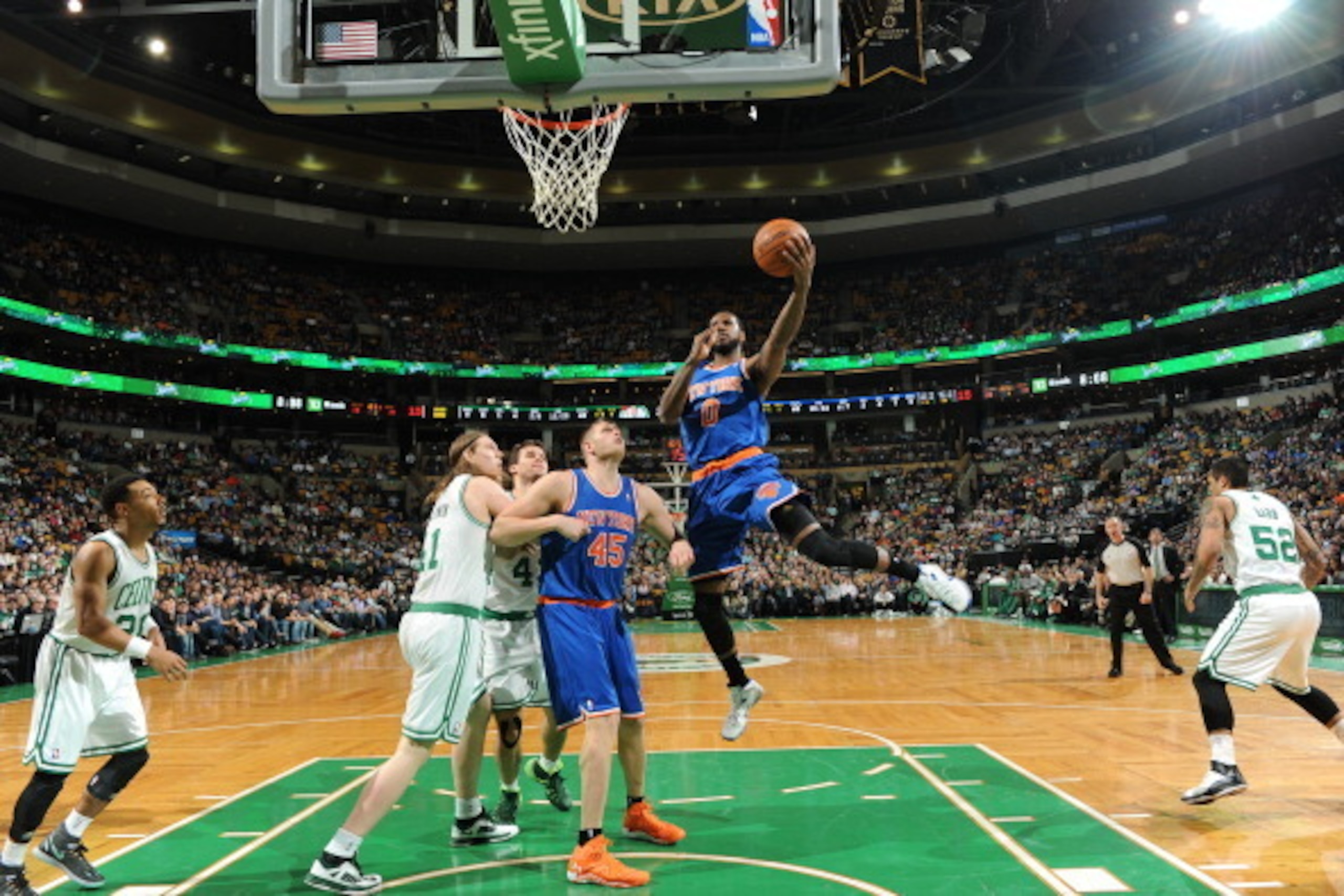 BOSTON, MA - MARCH 12: Earl Clark #0 of the New York Knicks goes up for a shot against the Boston Celtics on March 12, 2014 at the TD Garden in Boston, Massachusetts.  NOTE TO USER: User expressly acknowledges and agrees that, by downloading and or using 