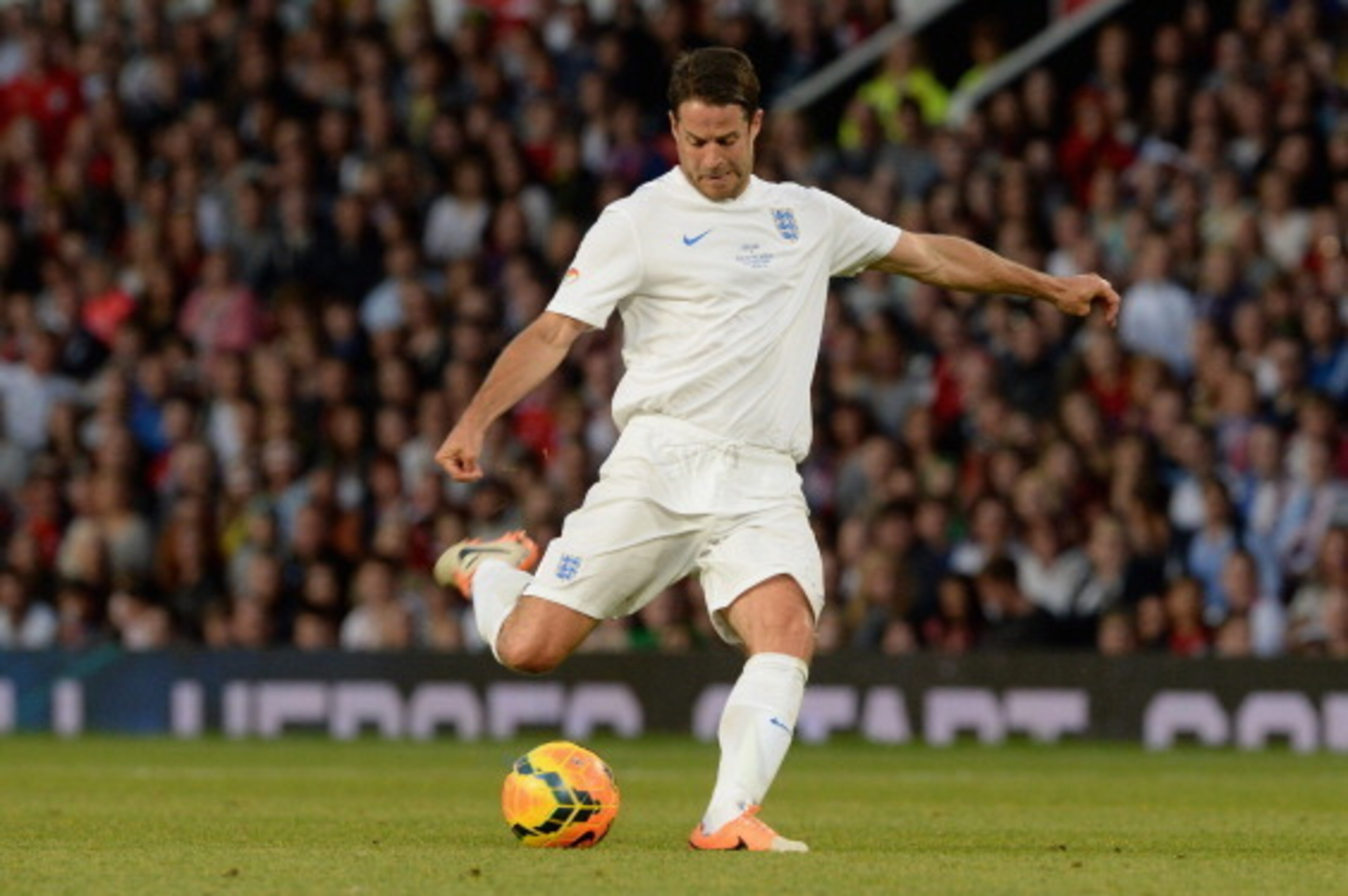 MANCHESTER, ENGLAND - JUNE 08:  Jamie Redknapp of England scores the equalising goal during Soccer Aid 2014 at Old Trafford on June 8, 2014 in Manchester, England.  (Photo by Dave J Hogan/Getty Images)