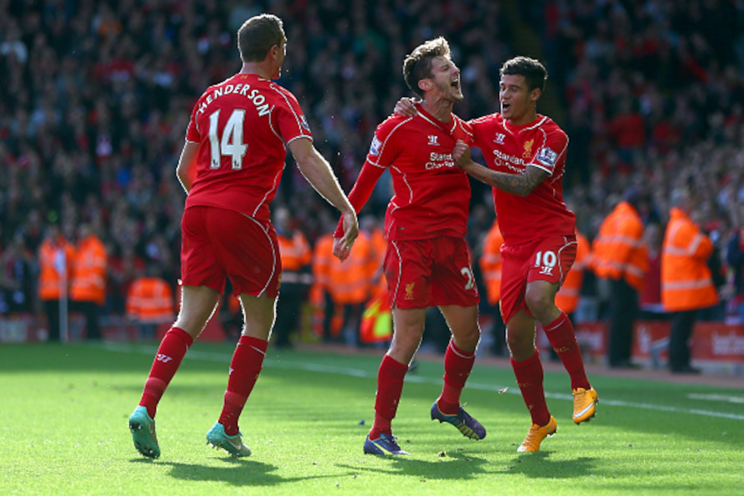 LIVERPOOL, ENGLAND - OCTOBER 04: Adam Lallana of Liverpool is congratulated by Philippe Coutinho (R) and Jordan Henderson of Liverpool (L) on scoring the opening goal during the Barclays Premier League match between Liverpool and West Bromwich Albion at A LIVERPOOL, ENGLAND - OCTOBER 04: Adam Lallana of Liverpool is congratulated by Philippe Coutinho (R) and Jordan Henderson of Liverpool (L) on scoring the opening goal during the Barclays Premier League match between Liverpool and West Bromwich Albion at A