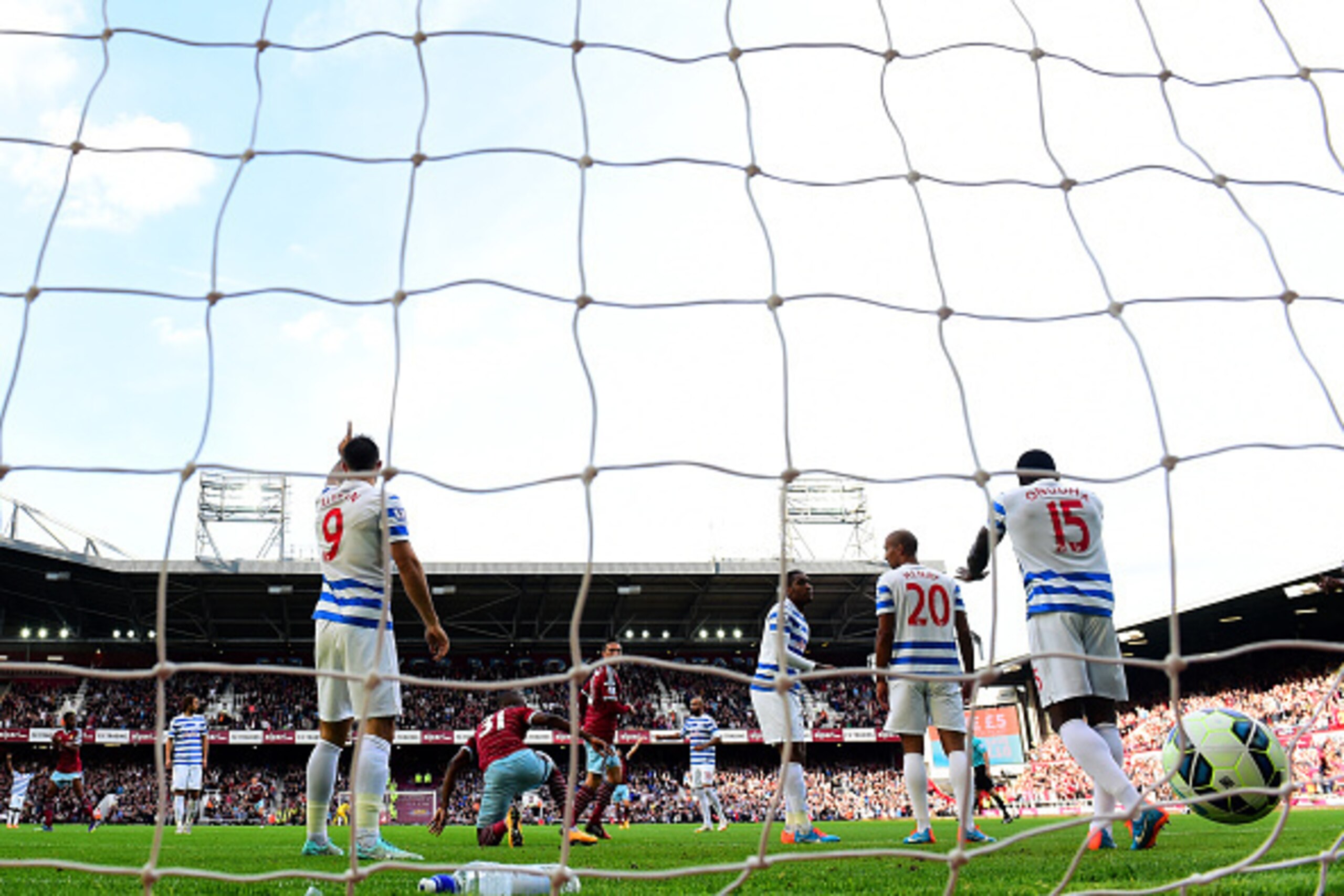LONDON, ENGLAND - OCTOBER 05: QPR players react after Nedum Onuoha of QPR scored an own goal during the Barclays Premier League match between West Ham United and Queens Park Rangers at Boleyn Ground on October 5, 2014 in London, England. (Photo by Jamie LONDON, ENGLAND - OCTOBER 05: QPR players react after Nedum Onuoha of QPR scored an own goal during the Barclays Premier League match between West Ham United and Queens Park Rangers at Boleyn Ground on October 5, 2014 in London, England. (Photo by Jamie