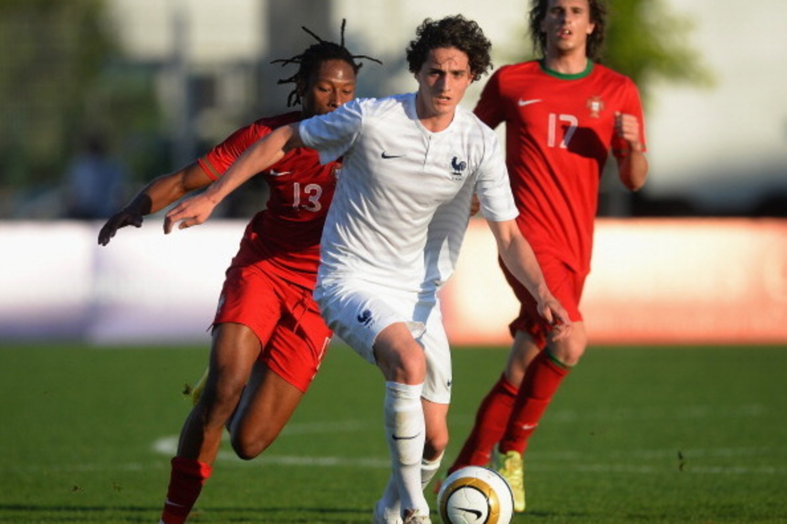 TOULON, FRANCE - MAY 29:  Adrien Rabiot of France gets ahead of Ruben Semedo of Portugal during the Toulon Tournament Group A match between France v Portugal at the Leo Legrange Stadium on May 29, 2014 in Toulon, France.  (Photo by Christopher Lee/Getty I