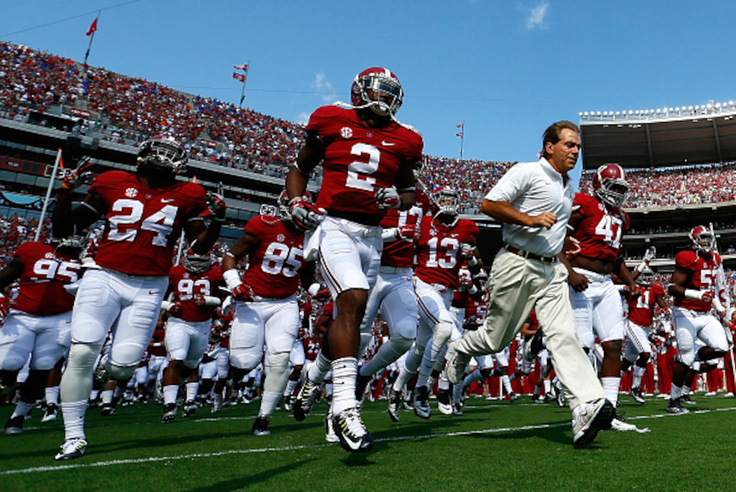 TUSCALOOSA, AL - SEPTEMBER 20:  Head coach Nick Saban of the Alabama Crimson Tide leads his team onto the field prior to the game against the Florida Gators at Bryant-Denny Stadium on September 20, 2014 in Tuscaloosa, Alabama.  (Photo by Kevin C. Cox/Gett