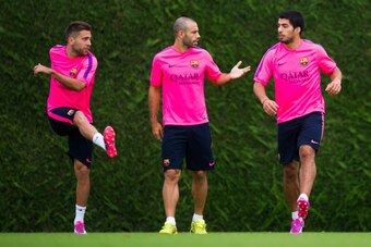 BARCELONA, SPAIN - AUGUST 17: Jordi Alba, Javier Mascherano and Luis Suarez are seen during a FC Barcelona training session at Ciutat Esportiva on August 17, 2014 in Barcelona, Spain.  (Photo by Alex Caparros/Getty Images)