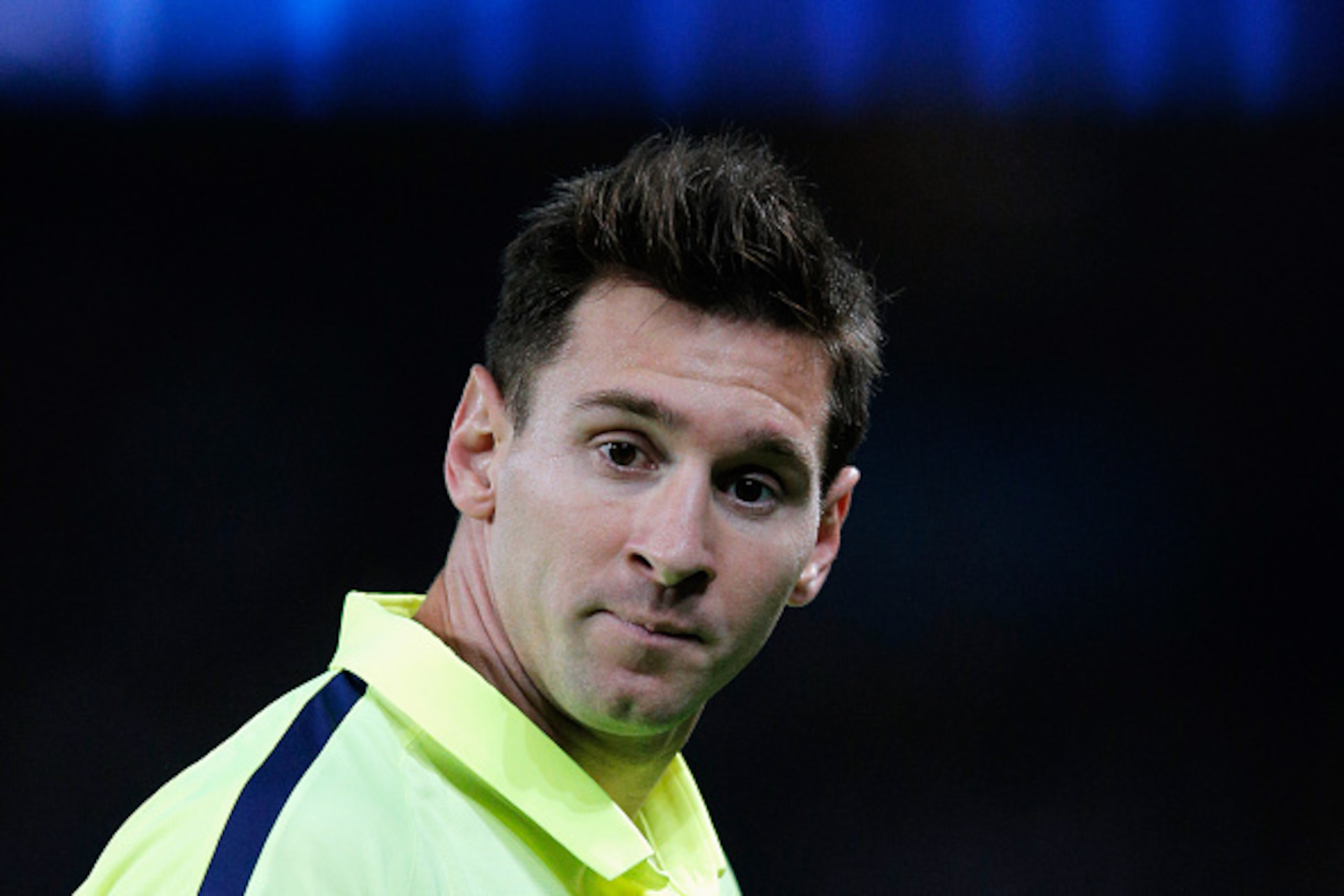 PARIS, FRANCE - SEPTEMBER 30:  Lionel Messi of Barcelona looks on during the Group F UEFA Champions League match between Paris Saint-Germain v FC Barcelona held at Parc des Princes on September 30, 2014 in Paris, France.  (Photo by Dean Mouhtaropoulos/Get