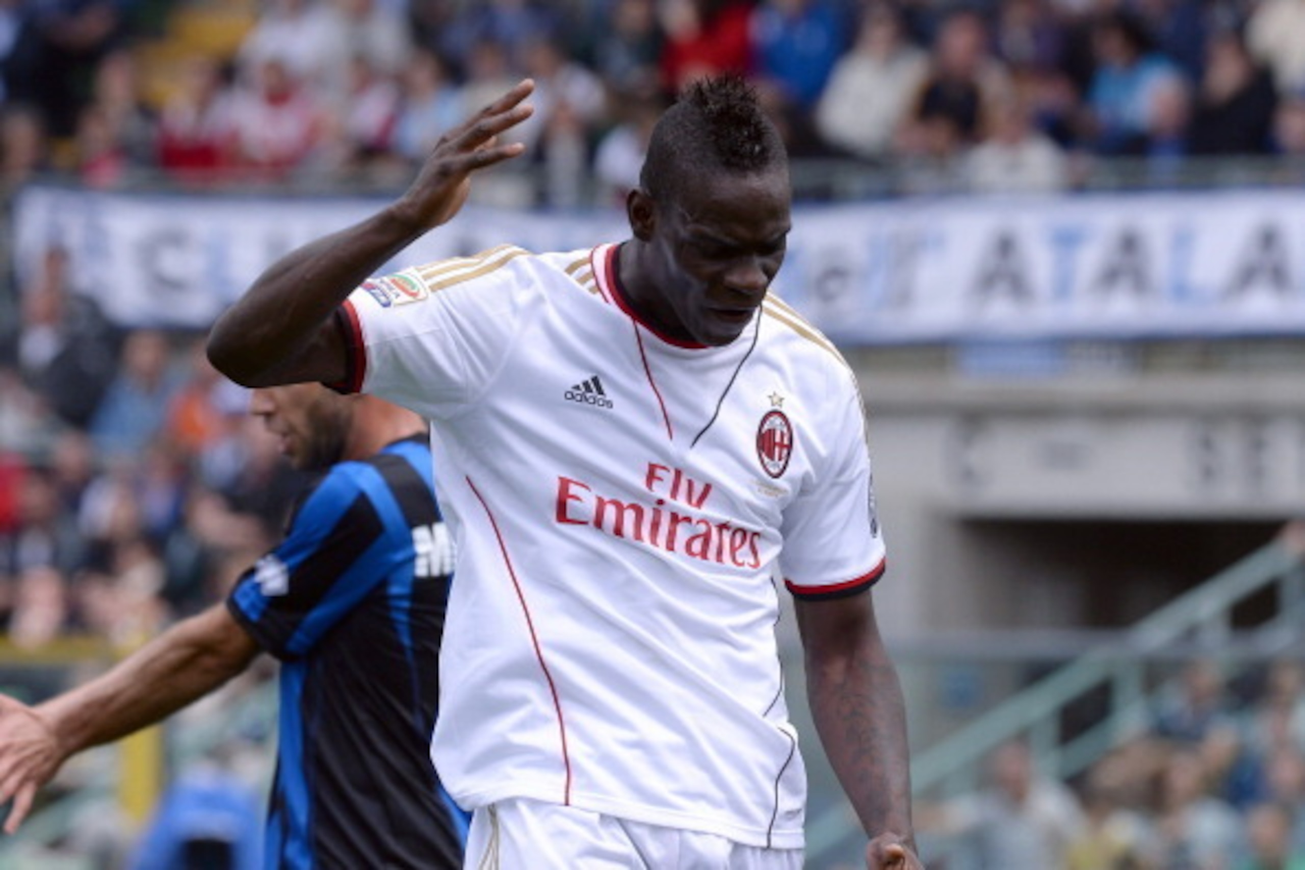 BERGAMO, ITALY - MAY 11:  Mario Balotelli of AC Milan shows his dejection during the Serie A match between Atalanta BC and AC Milan at Stadio Atleti Azzurri d'Italia on May 11, 2014 in Bergamo, Italy.  (Photo by Claudio Villa/Getty Images)