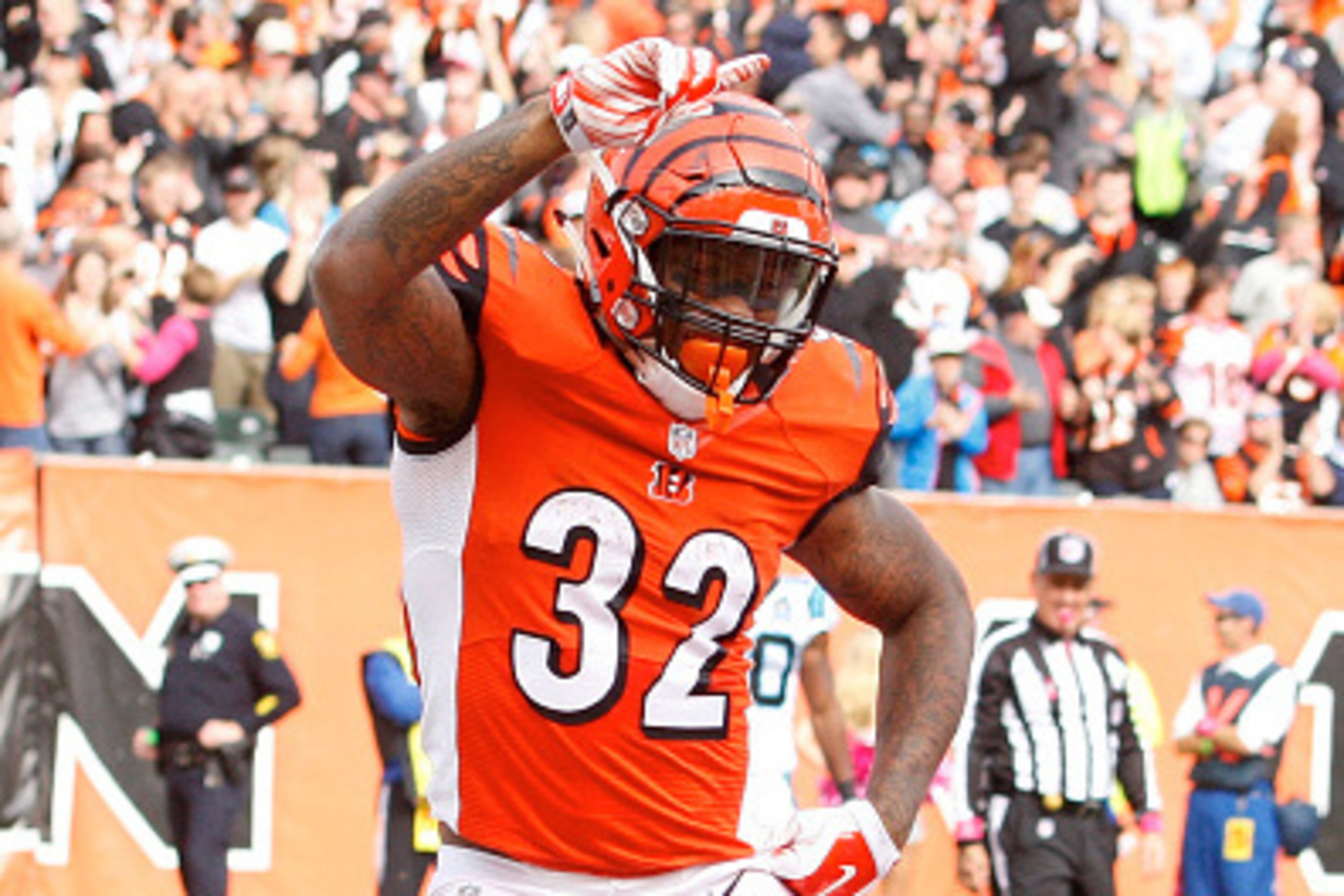 CINCINNATI, OH - OCTOBER 12:  Jeremy Hill #32 of the Cincinnati Bengals celebrates a touchdown by dancing the 'Ickey Shuffle' during the fourth quarter against the Carolina Panthers at Paul Brown Stadium on October 12, 2014 in Cincinnati, Ohio. Cincinnati
