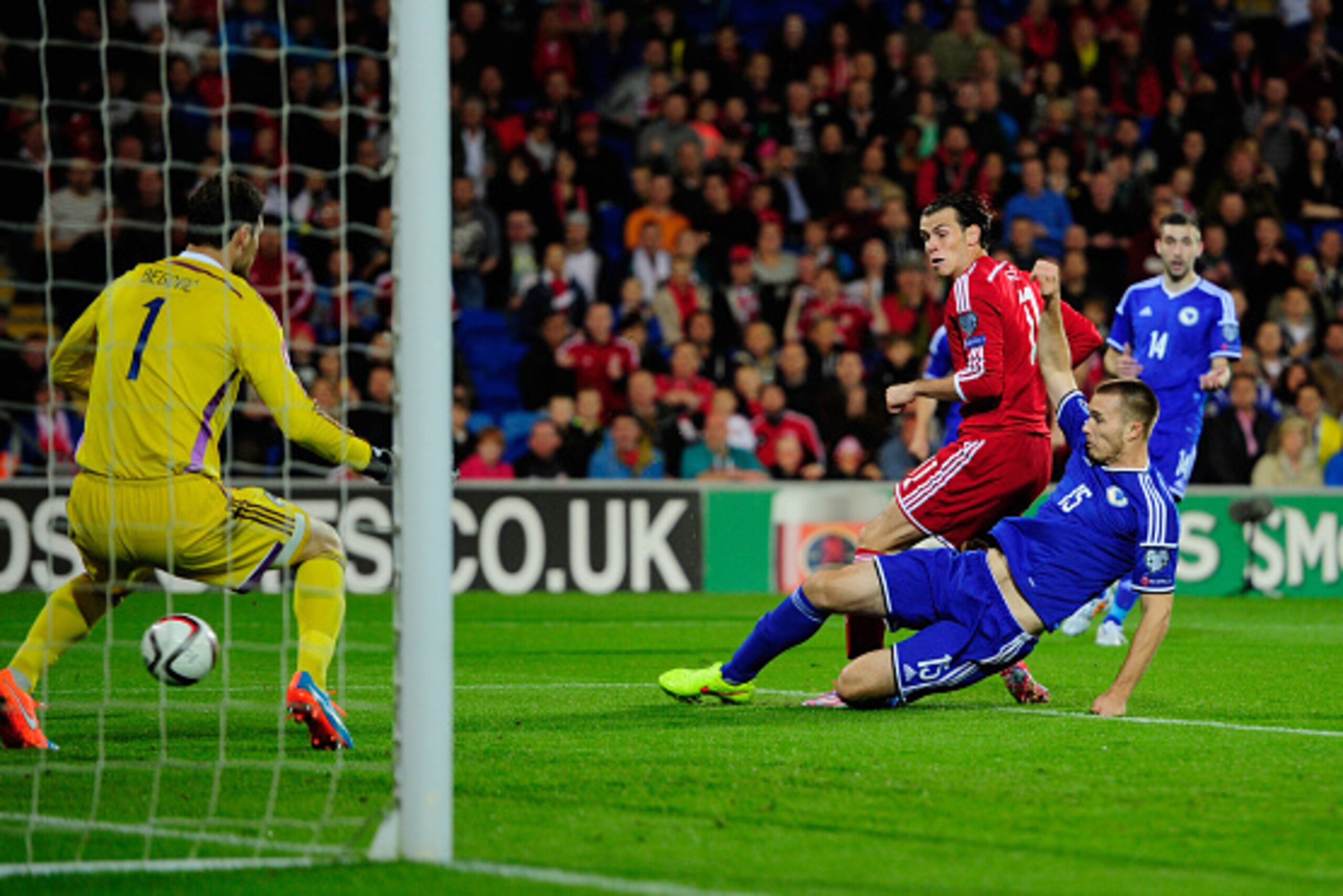 CARDIFF, WALES - OCTOBER 10: Wales striker Gareth Bale gets in a shot at goal during the  EURO 2016 Qualifier match between Wales and Bosnia and Herzegovina at Cardiff City Stadium on October 10, 2014 in Cardiff, Wales.  (Photo by Stu Forster/Getty Images