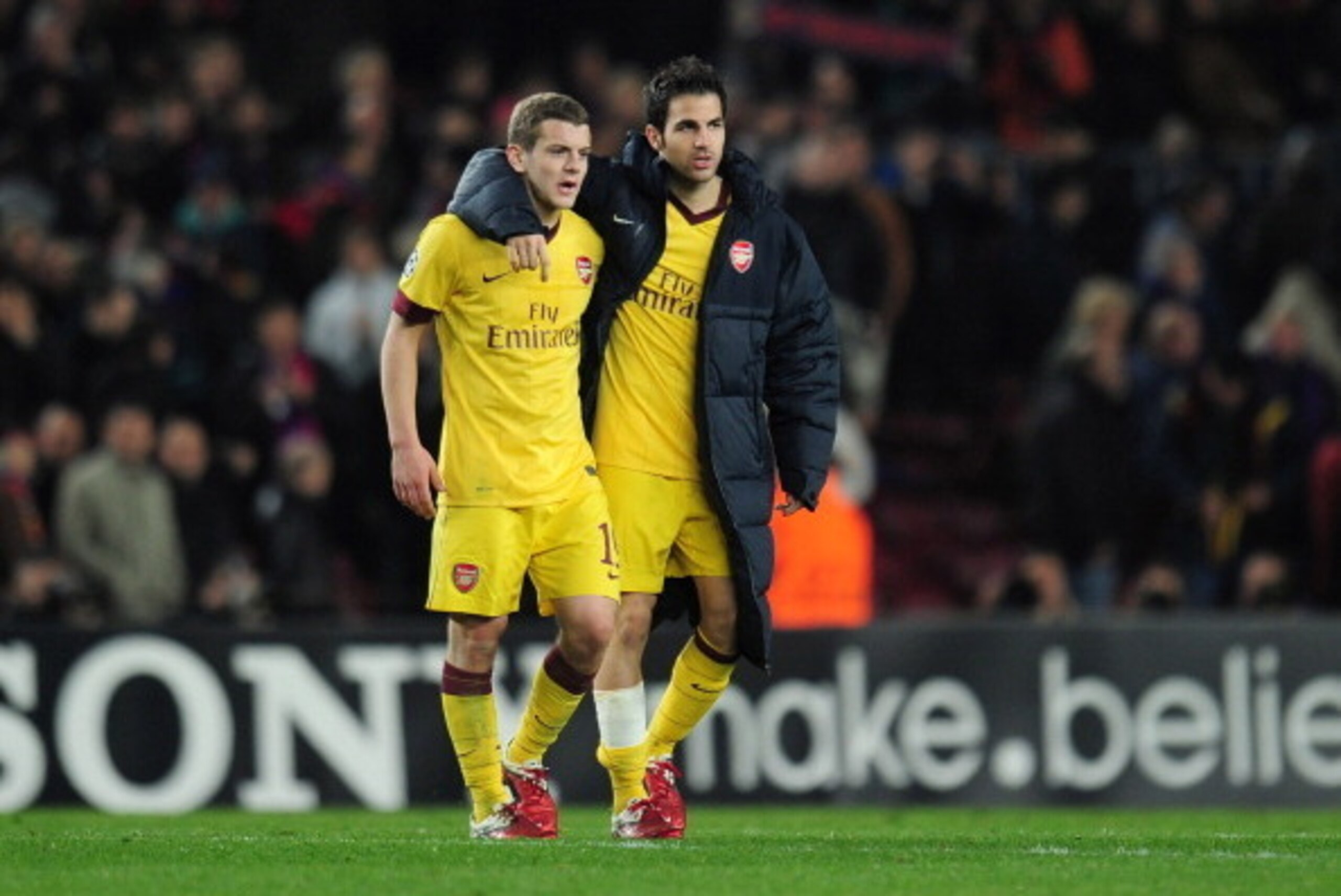 BARCELONA, SPAIN - MARCH 08:  Jack Wilshere and Cesc Fabregas of Arsenal leave the field at the end of the UEFA Champions League round of 16 second leg match between Barcelona and Arsenal at the Nou Camp Stadium on March 8, 2011 in Barcelona, Spain.  (Pho