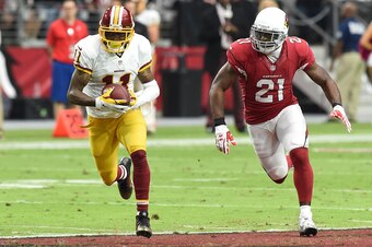 GLENDALE, AZ - OCTOBER 12: Wide receiver DeSean Jackson #11 of the Washington Redskins runs past cornerback Patrick Peterson #21 of the Arizona Cardinals for a touchdown during the second quarter of the NFL game at University of Phoenix Stadium on October