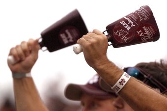 STARKVILLE, MS - SEPTEMBER 08:  Mississippi State fans wave cowbells in the first quarter of a NCAA college football game against Auburn on September 8, 2012 at Davis Wade Stadium in Starkville, Mississippi. (Photo by Butch Dill/Getty Images)