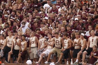 STARKVILLE, MS - SEPTEMBER 08:  Mississippi State Bulldogs fans shake their cowbells in the first quarter of a NCAA college football game against Auburn Tigers on September 8, 2012 at Davis Wade Stadium in Starkville, Mississippi. (Photo by Butch Dill/Get