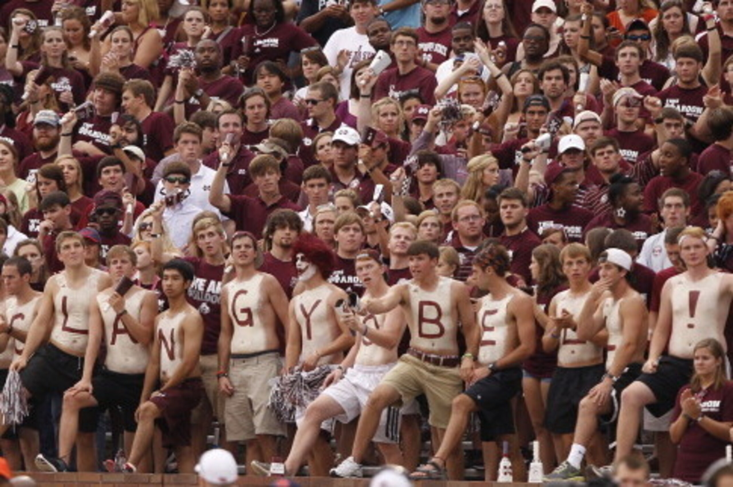 STARKVILLE, MS - SEPTEMBER 08:  Mississippi State Bulldogs fans shake their cowbells in the first quarter of a NCAA college football game against Auburn Tigers on September 8, 2012 at Davis Wade Stadium in Starkville, Mississippi. (Photo by Butch Dill/Get