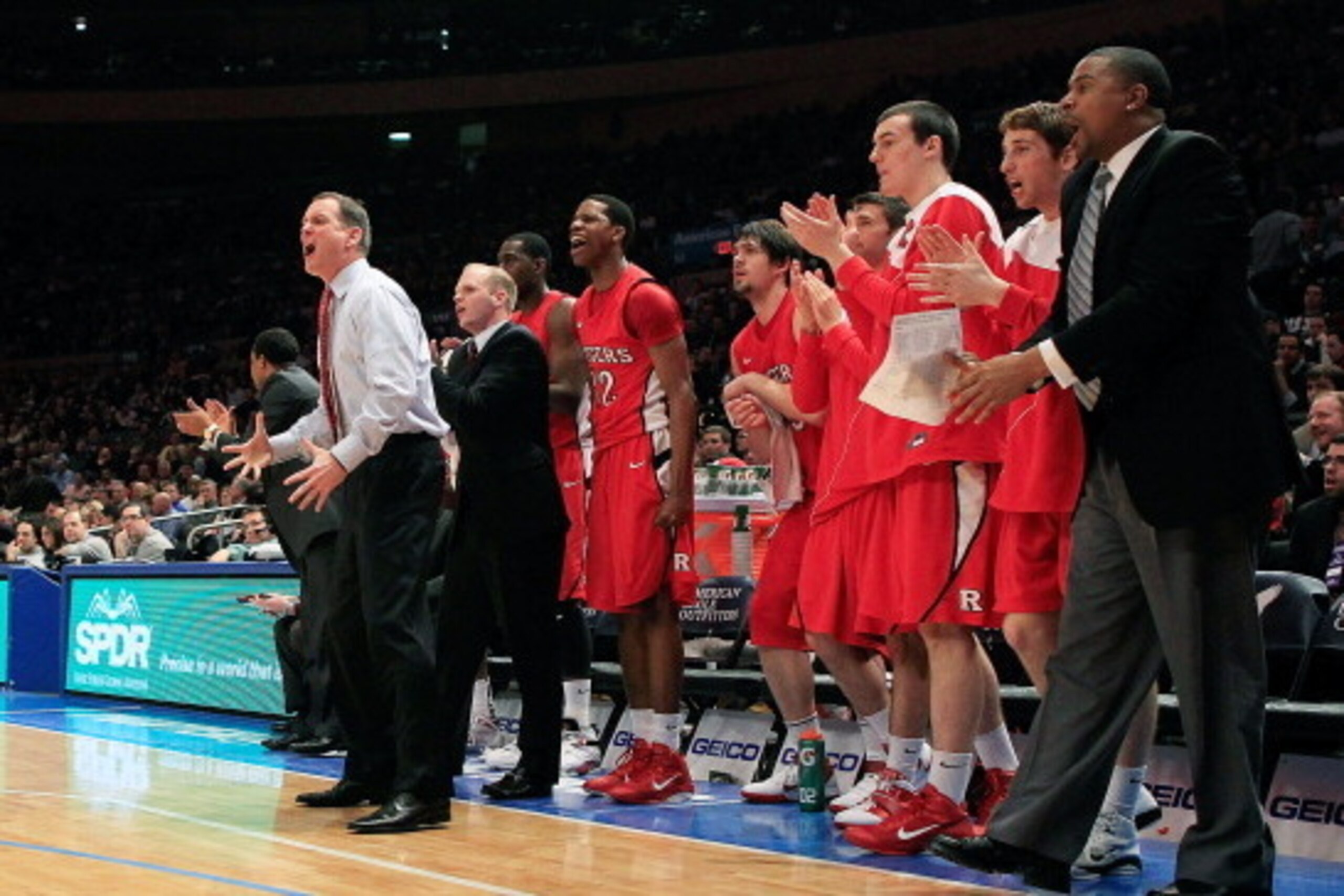 NEW YORK, NY - MARCH 09:  Head coach Mike Rice of the Rutgers Scarlet Knights gestures from the bench during the game against the St.Johns Red Storm during the second round of the 2011 Big East Men's Basketball Tournament presented by American Eagle Outfi