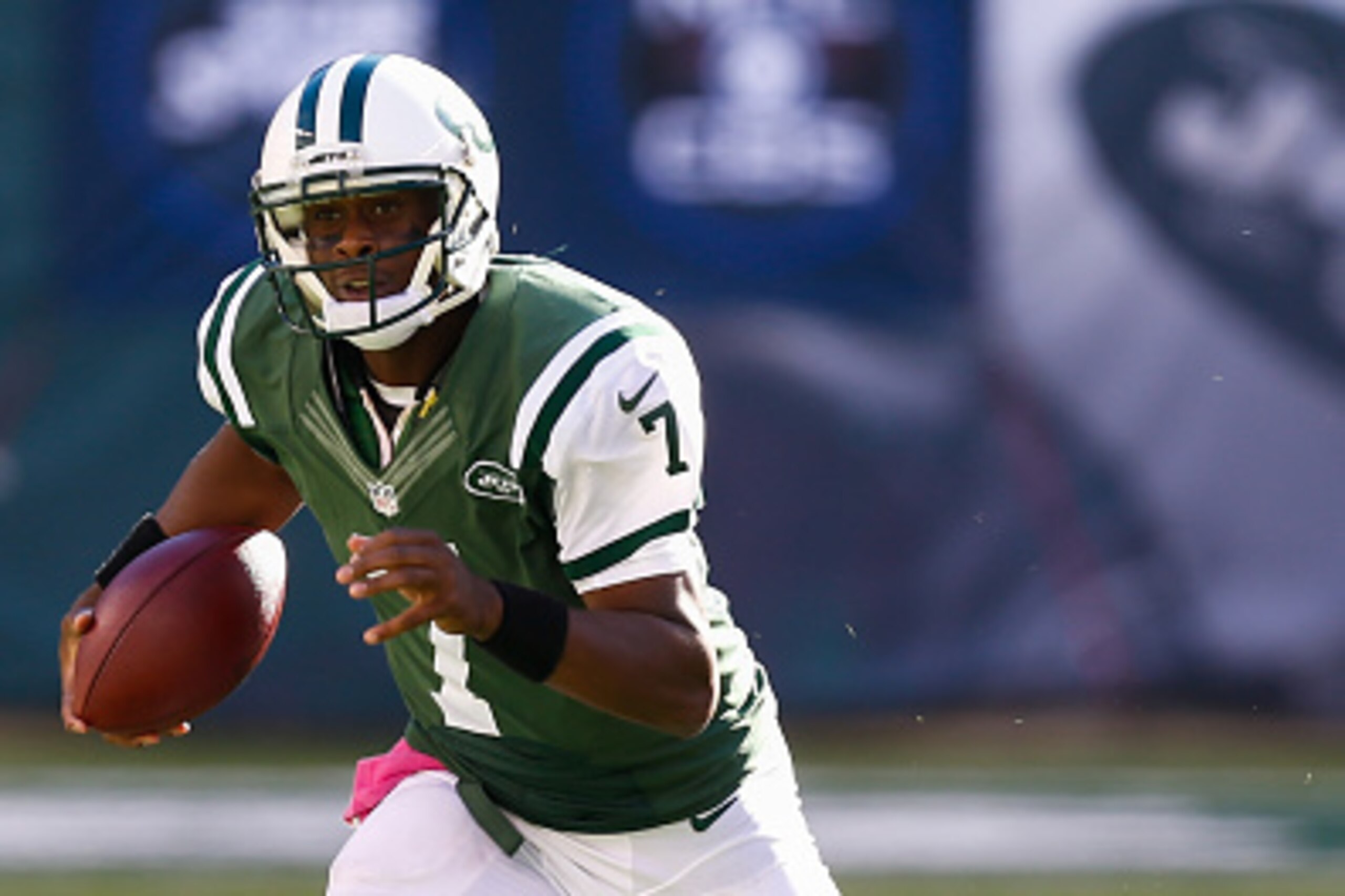 EAST RUTHERFORD, NJ - OCTOBER 12: Geno Smith #7 of the New York Jets runs the ball during a game against the Denver Broncos at MetLife Stadium on October 12, 2014 in East Rutherford, New Jersey.  (Photo by Jeff Zelevansky/Getty Images)