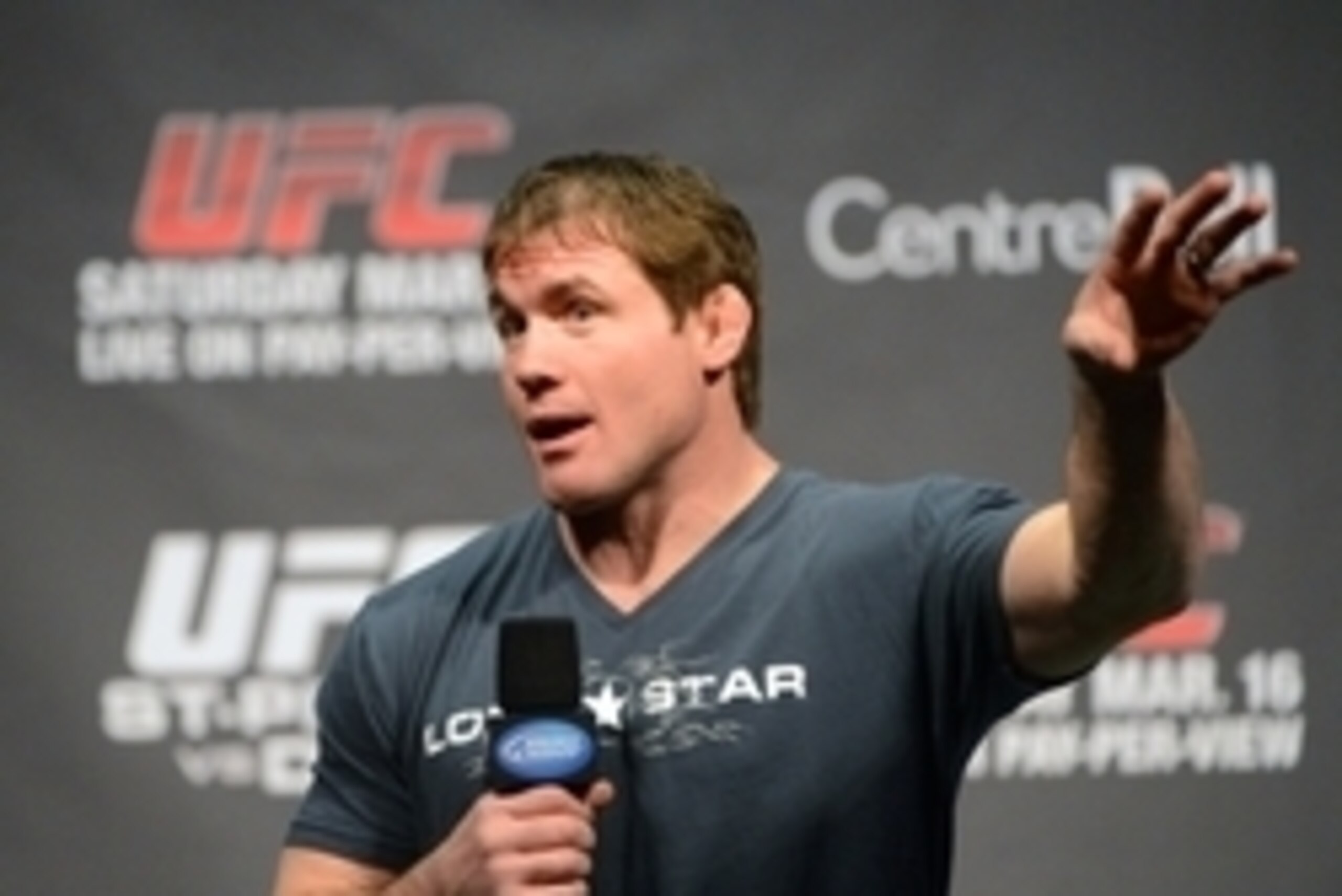 Mar 15, 2013; Montreal, Quebec, Canada;former UFC fighter Matt Hughes speaks to the fans during the weight-in for UFC 158 at the Bell Centre. Mandatory Credit: Eric Bolte-USA TODAY Sports