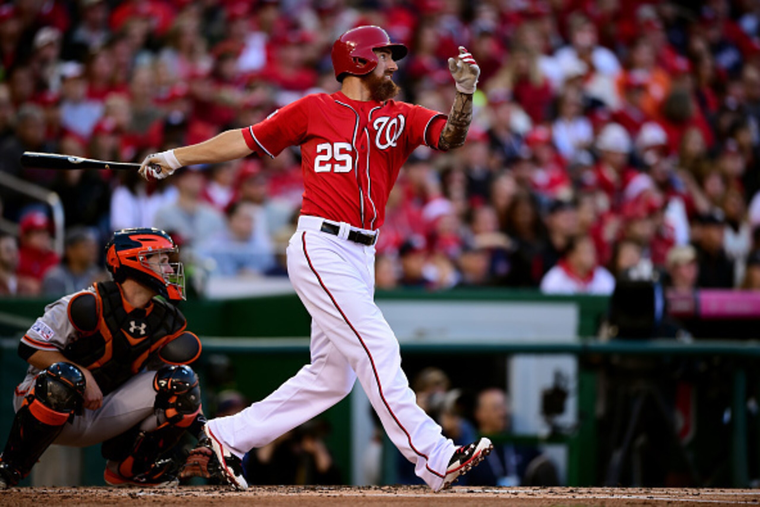WASHINGTON, DC - OCTOBER 04:  Adam LaRoche #25 of the Washington Nationals lined out to left field in the first inning against Tim Hudson #17 of the San Francisco Giants during Game Two of the National League Division Series at Nationals Park on October 4