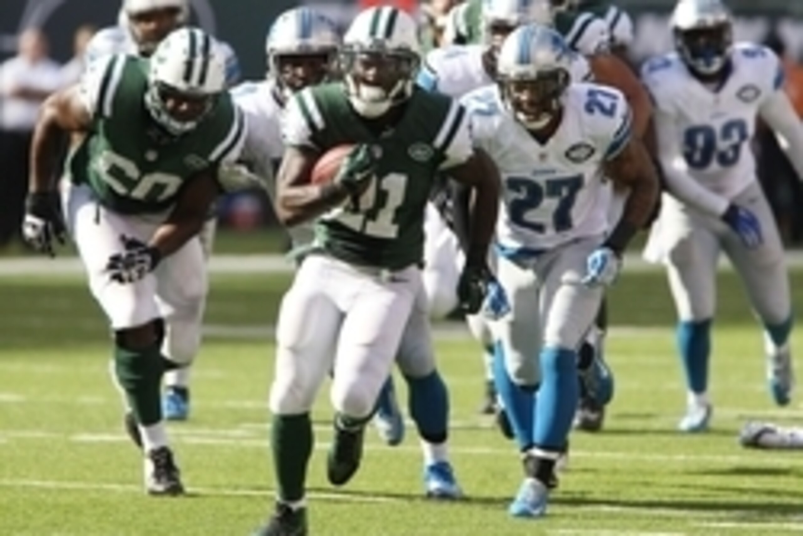 Sep 28, 2014; East Rutherford, NJ, USA;  New York Jets running back Chris Johnson (21) carries the ball to score a touchdown in the second half against the Detroit Lions at MetLife Stadium. Mandatory Credit: Noah K. Murray-USA TODAY Sports