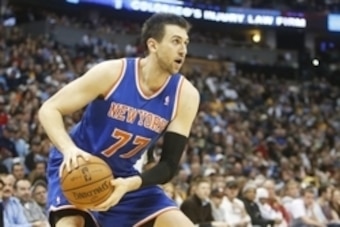 Nov 29, 2013; Denver, CO, USA; New York Knicks center Andrea Bargnani (77) prepares to shoot during the first half against the Denver Nuggets at Pepsi Center. Mandatory Credit: Chris Humphreys-USA TODAY Sports
