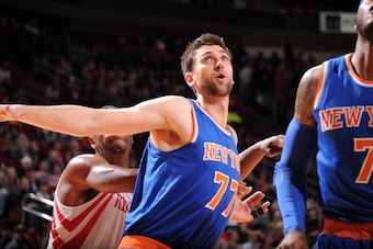 HOUSTON, TX - JANUARY 3:  Andrea Bargnani #77 of the New York Knicks battles for the rebound against the Houston Rockets on January 3, 2014 at the Toyota Center in Houston, Texas. NOTE TO USER: User expressly acknowledges and agrees that, by downloading a