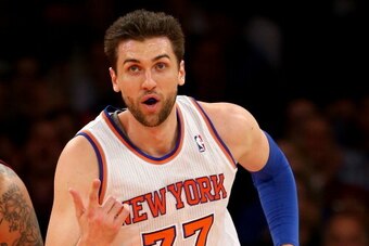 NEW YORK, NY - JANUARY 09:  Andrea Bargnani #77 of the New York Knicks celebrates his basket in the first half against the Miami Heat at Madison Square Garden on January 9, 2014 in New York City. NOTE TO USER: User expressly acknowledges and agrees that, 