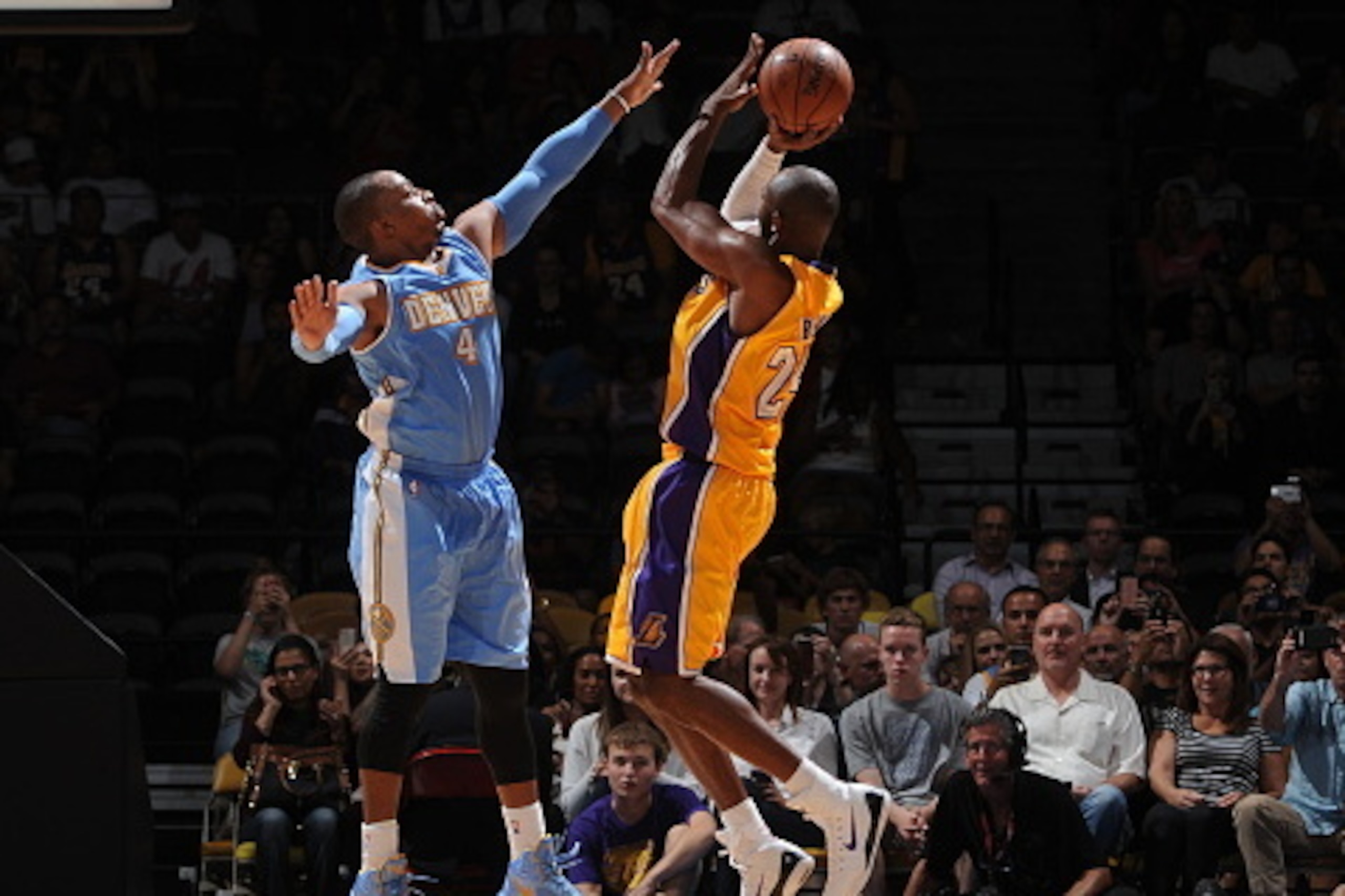 SAN DIEGO, CA- OCTOBER 6: Kobe Bryant #24 of the Los Angeles Lakers shoots against Randy Foye #4 of the Denver Nuggets as the Los Angeles Lakers take on the Denver Nuggets at the Valley View Sports Arena in San Diego, California on October 6, 2014 . NOTE 