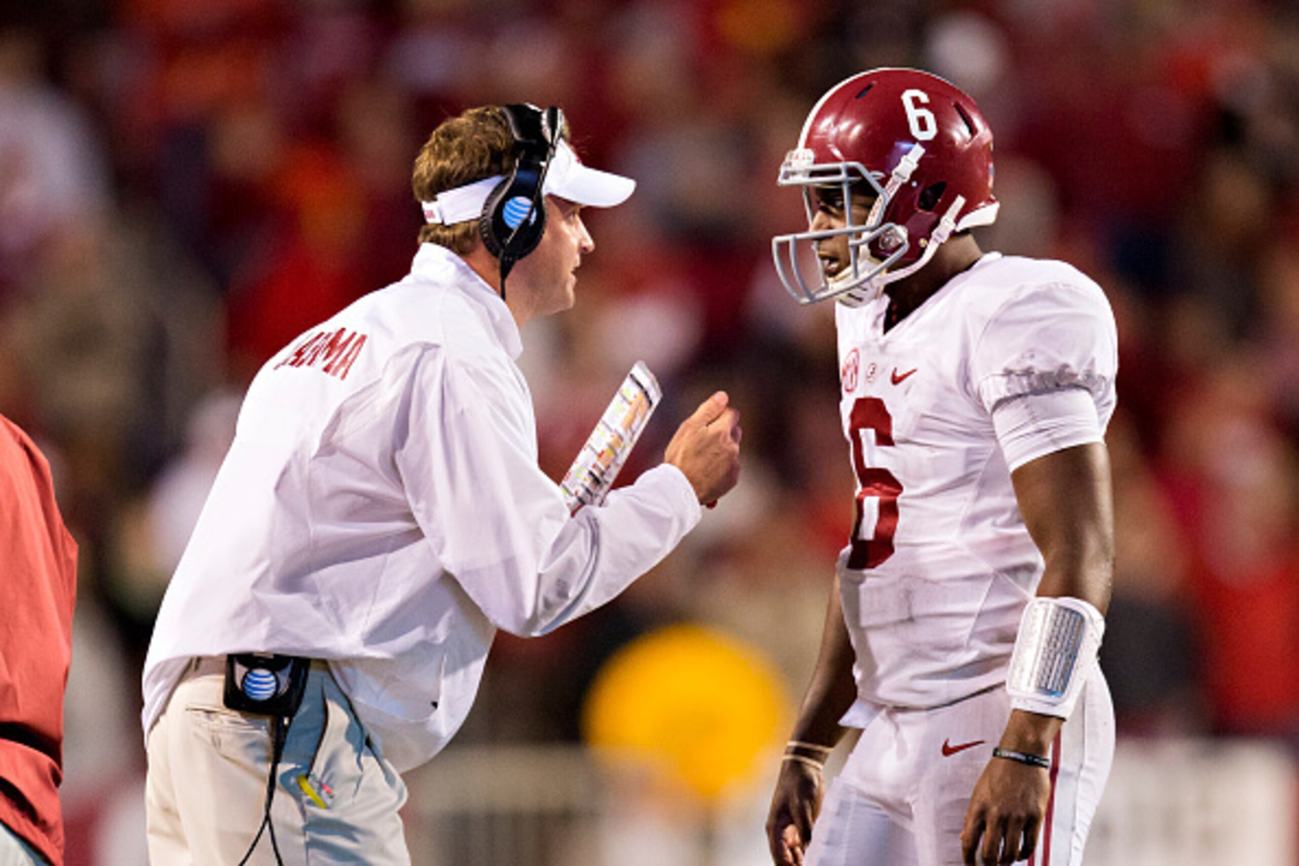 FAYETTEVILLE, AR - OCTOBER 11: Lane Kfffin talks with Blake Sims #6 of the Alabama Crimson Tide during a game against the Arkansas Razorbacks at Razorback Stadium on October 11, 2014 in Fayetteville, Arkansas. The Crimson Tide defeated the Razorbacks 14 FAYETTEVILLE, AR - OCTOBER 11: Lane Kfffin talks with Blake Sims #6 of the Alabama Crimson Tide during a game against the Arkansas Razorbacks at Razorback Stadium on October 11, 2014 in Fayetteville, Arkansas. The Crimson Tide defeated the Razorbacks 14