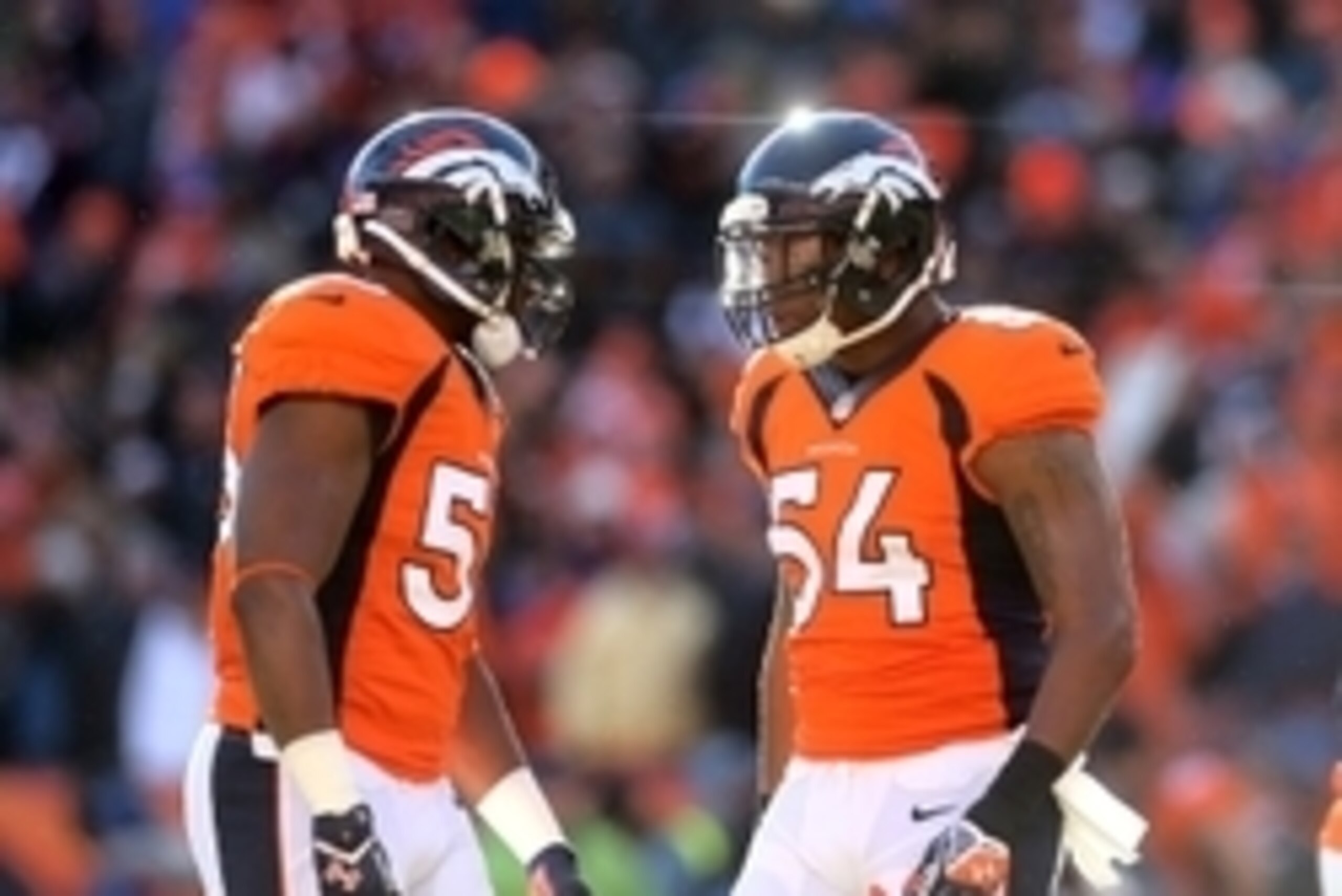 Jan 12, 2014; Denver, CO, USA; Denver Broncos linebacker Brandon Marshall (right) and linebacker Steven Johnson against the San Diego Chargers during the 2013 AFC divisional playoff football game at Sports Authority Field at Mile High. Mandatory Credit: M