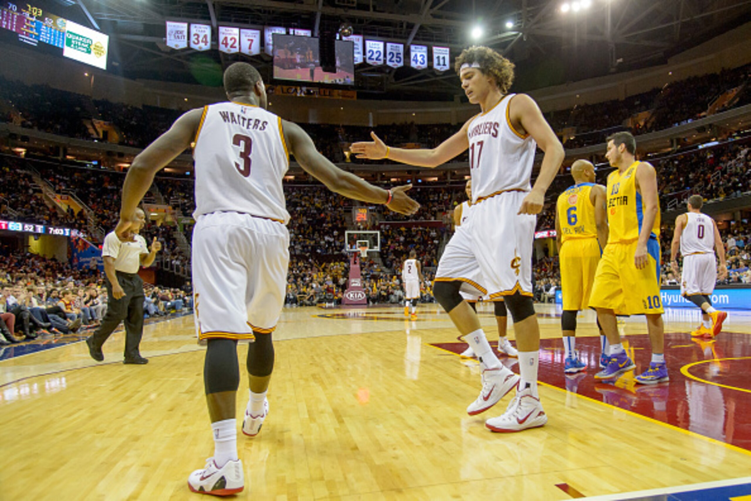 CLEVELAND, OH - OCTOBER 5:  Dion Waiters #3 and Anderson Varejao #17 of the Cleveland Cavaliers celebrate during the second half against Maccabi Tel Aviv at Quicken Loans Arena on October 5, 2014 in Cleveland, Ohio. The Cavaliers defeated Maccabi Tel Aviv