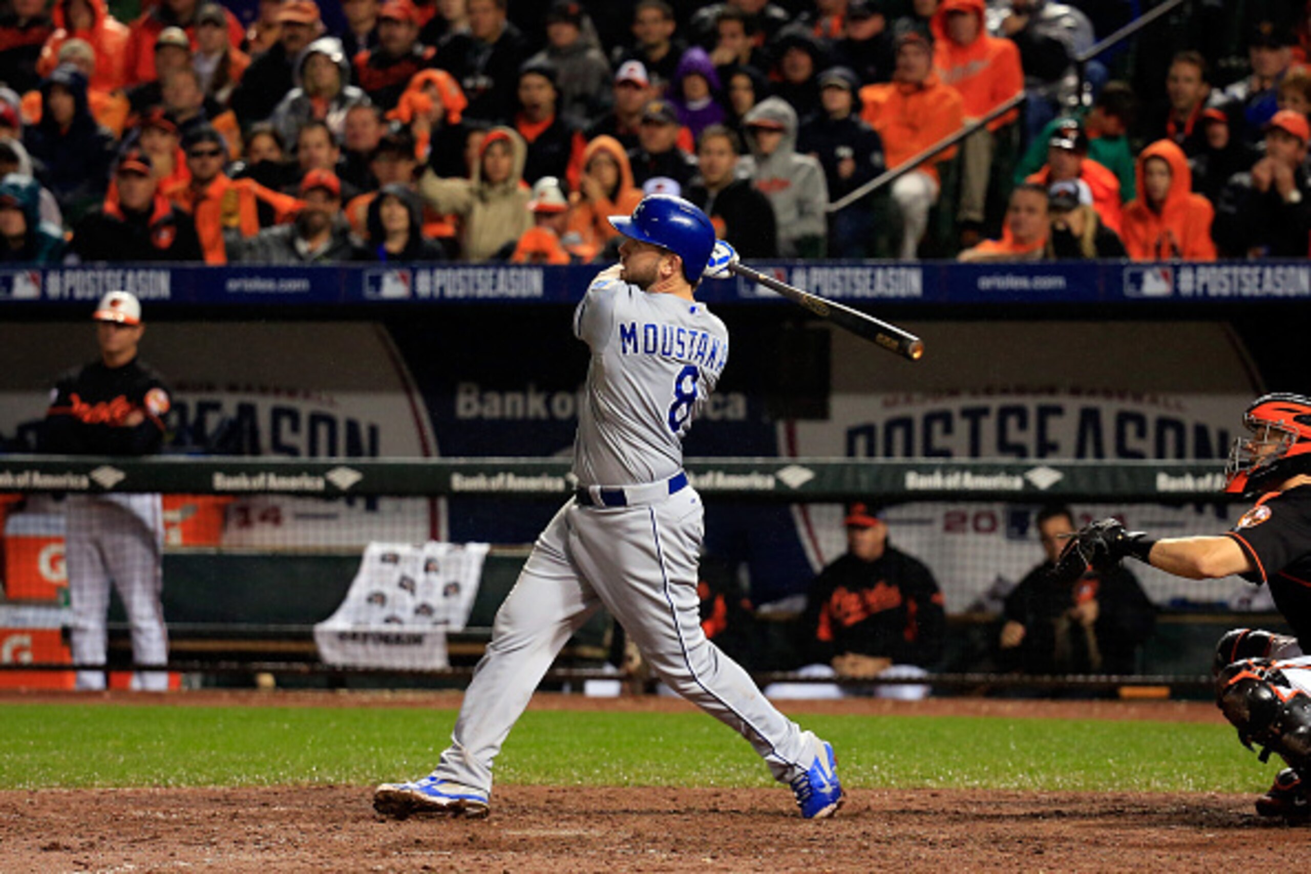 BALTIMORE, MD - OCTOBER 10:  Mike Moustakas #8 of the Kansas City Royals hits a two run home run to right center field against Brian Matusz #17 of the Baltimore Orioles in the tenth inning during Game One of the American League Championship Series at Orio