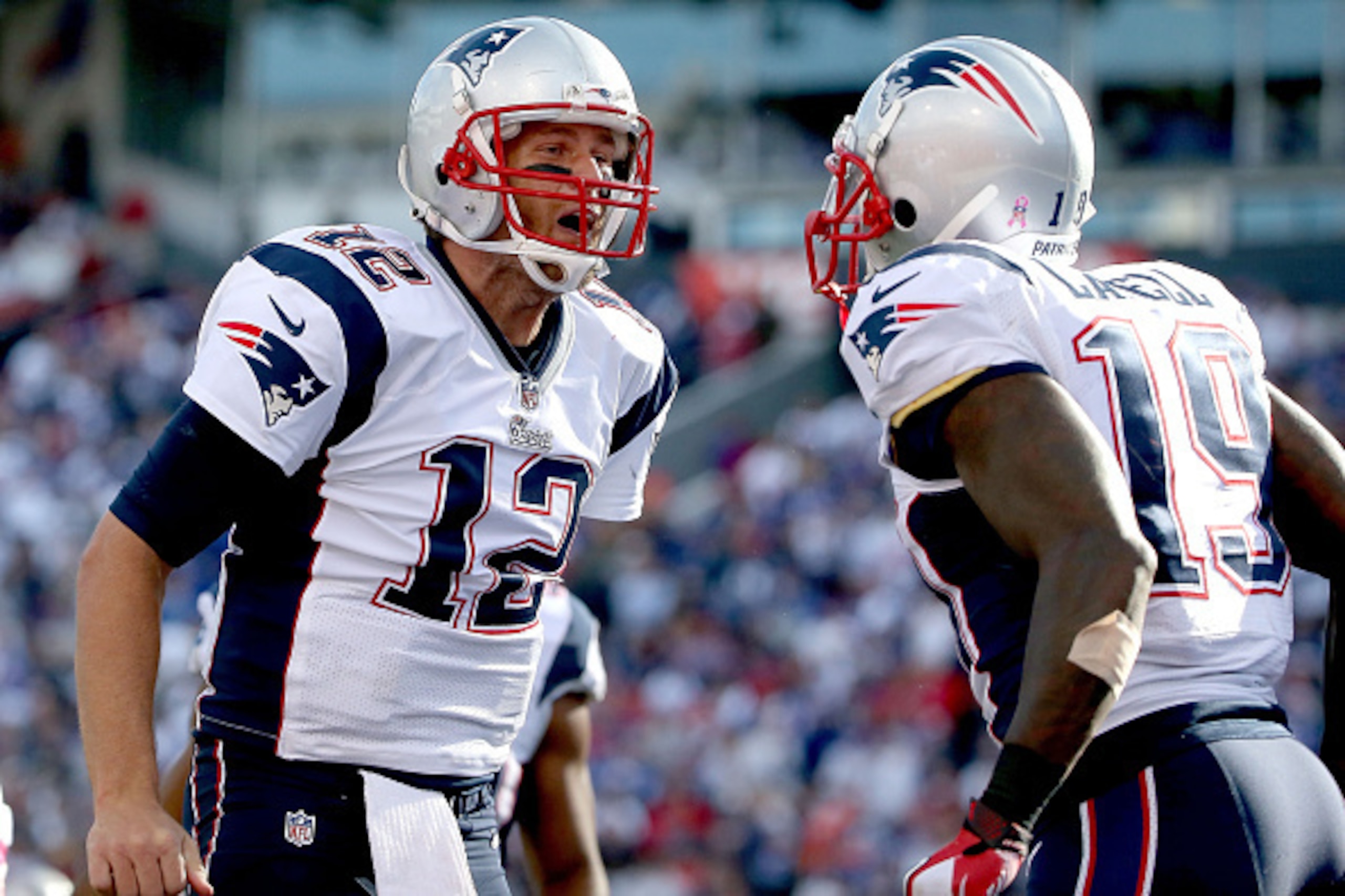 ORCHARD PARK, NY - OCTOBER 12:   Tom Brady #12 of the New England Patriots celebrates with  Brandon LaFell #19 of the New England Patriots after a touchdown reception during the second half at Ralph Wilson Stadium on October 12, 2014 in Orchard Park, New 