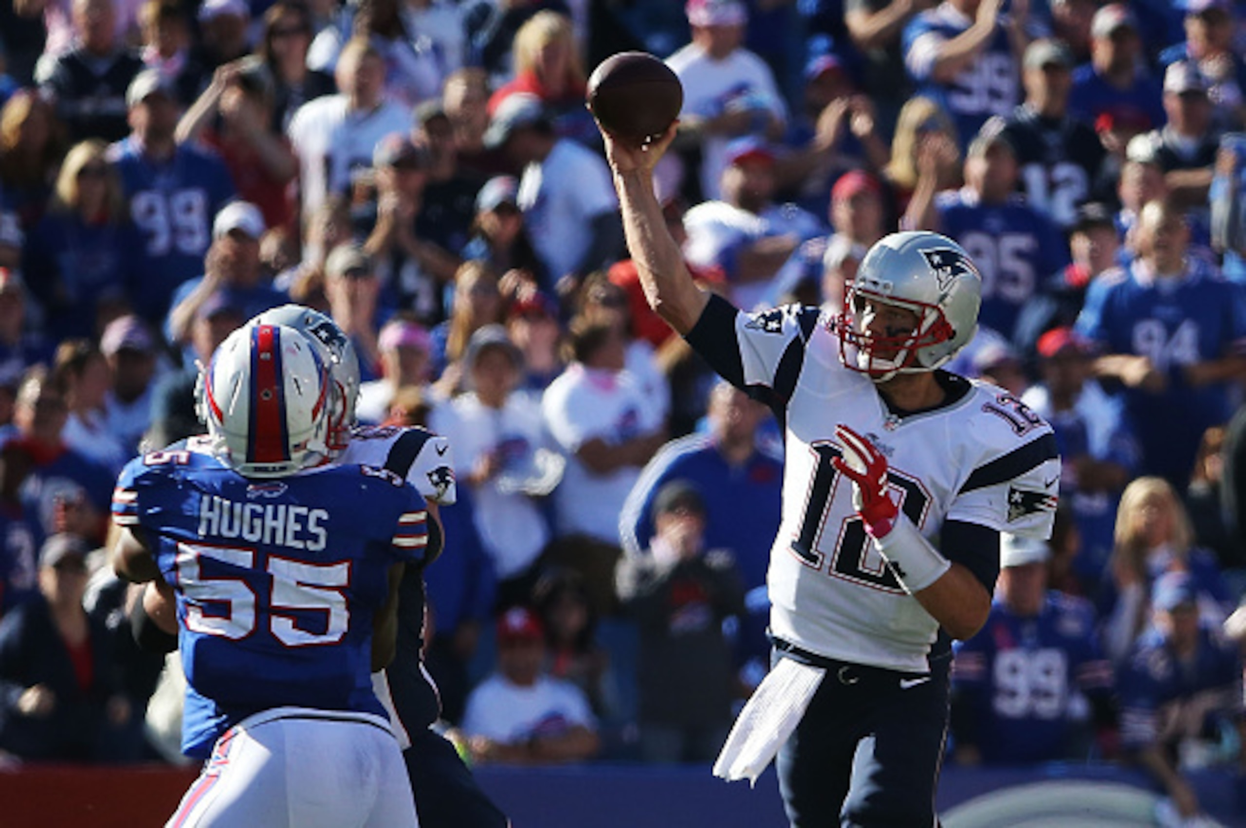 ORCHARD PARK, NY - OCTOBER 12:   Tom Brady #12 of the New England Patriots thorws against the Buffalo Bills during the second half at Ralph Wilson Stadium on October 12, 2014 in Orchard Park, New York.  (Photo by Tom Szczerbowski/Getty Images)