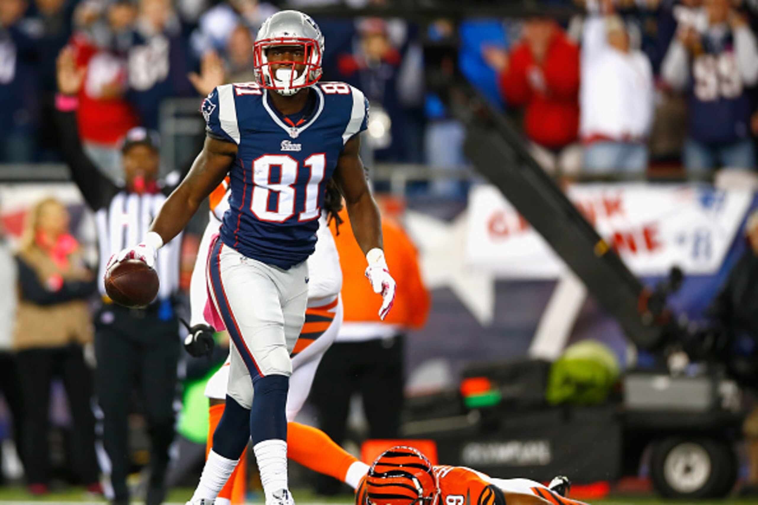 FOXBORO, MA - OCTOBER 05:  Tim Wright #81 of the New England Patriots celebrates after scoring a touchdown during the first quarter against the Cincinnati Bengals at Gillette Stadium on October 5, 2014 in Foxboro, Massachusetts.  (Photo by Jared Wickerham