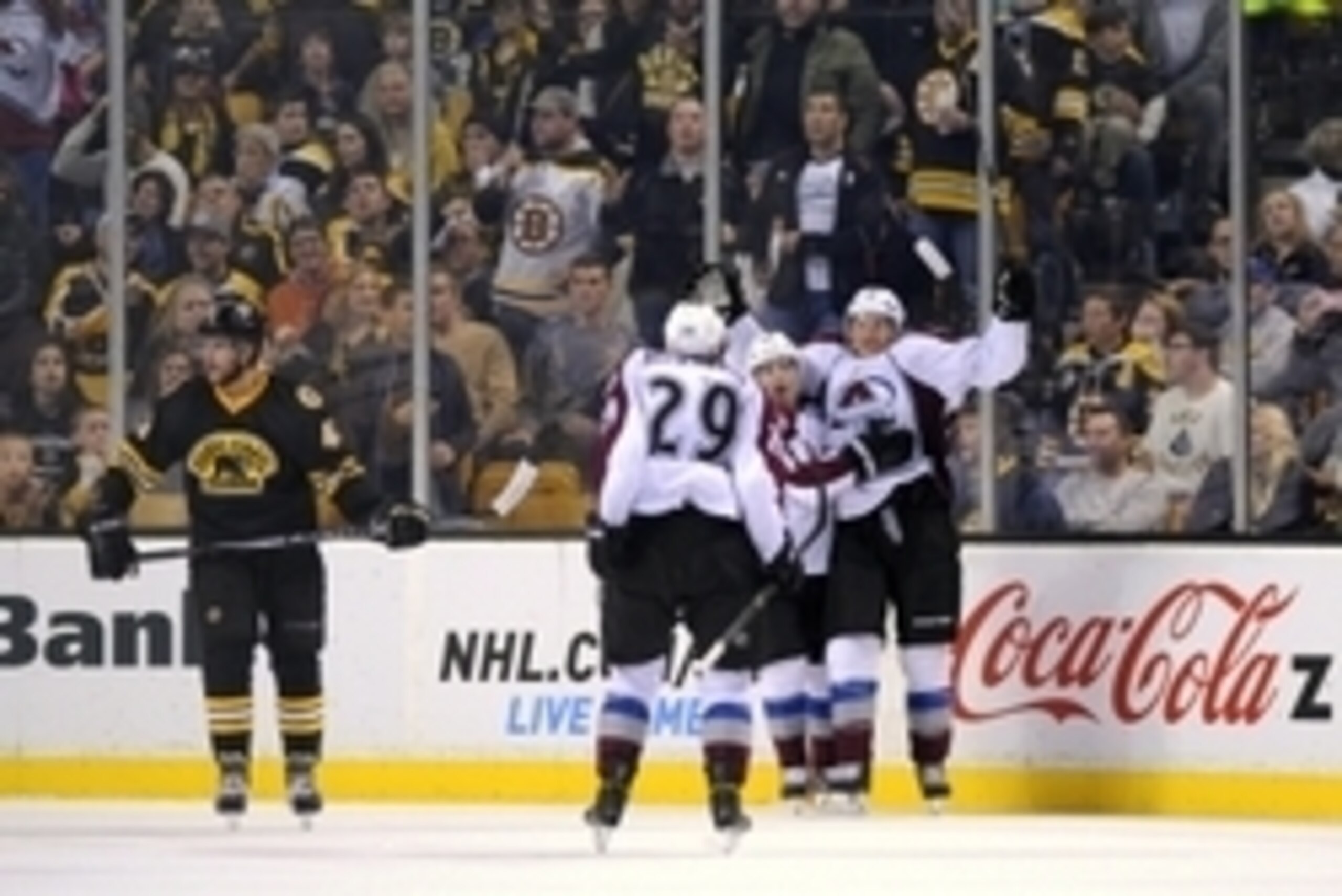 Oct 13, 2014; Boston, MA, USA; Colorado Avalanche center Nathan MacKinnon (29) reacts after the winning goal scored by center Daniel Briere (center) during the third period against the Boston Bruins at TD Banknorth Garden. Mandatory Credit: Bob DeChiara-U