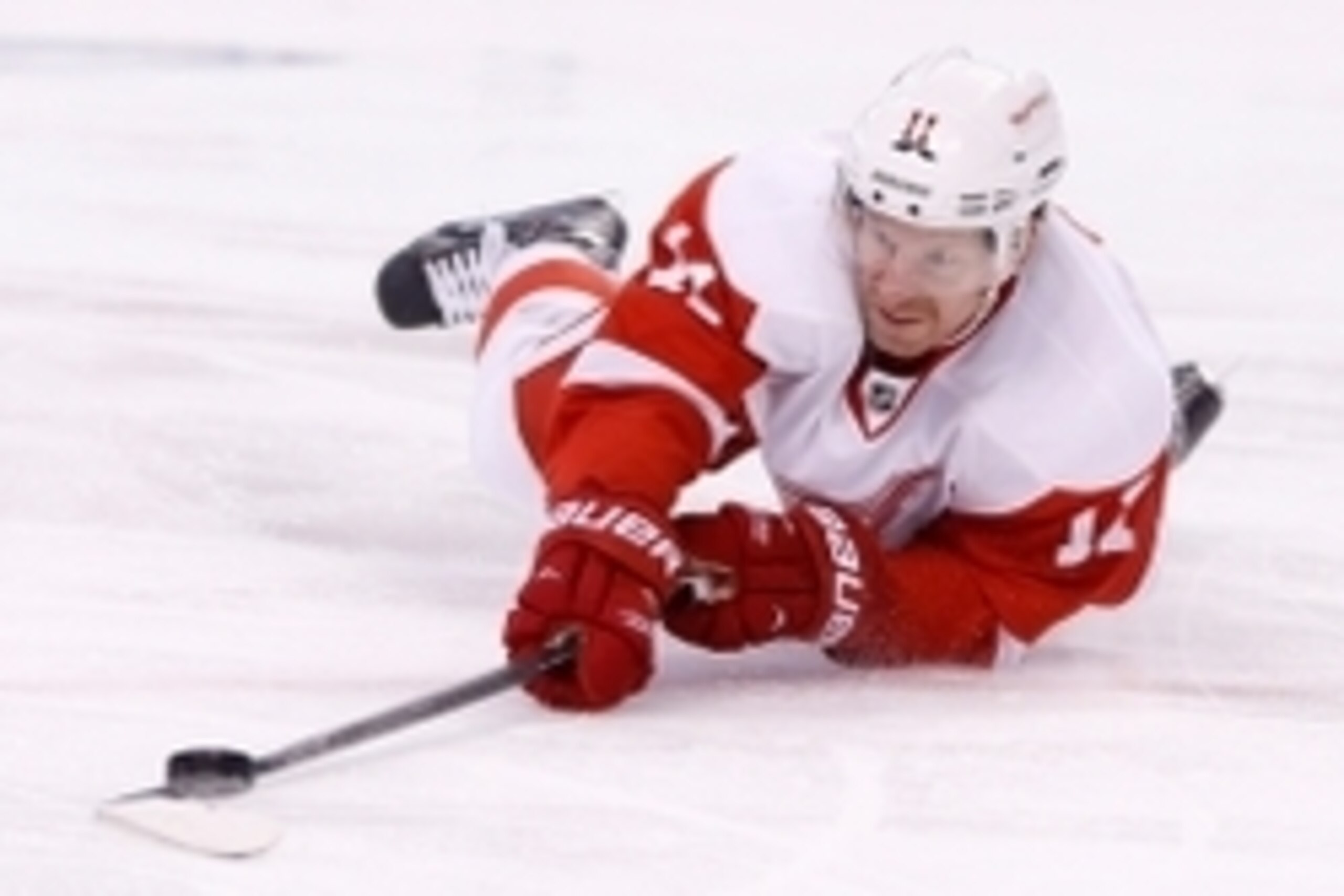 Apr 20, 2014; Boston, MA, USA; Detroit Red Wings right wing Daniel Alfredsson (11) shoots from the ice during the second period against the Boston Bruins in game two of the first round of the 2014 Stanley Cup Playoffs at TD Banknorth Garden. Mandatory Cre