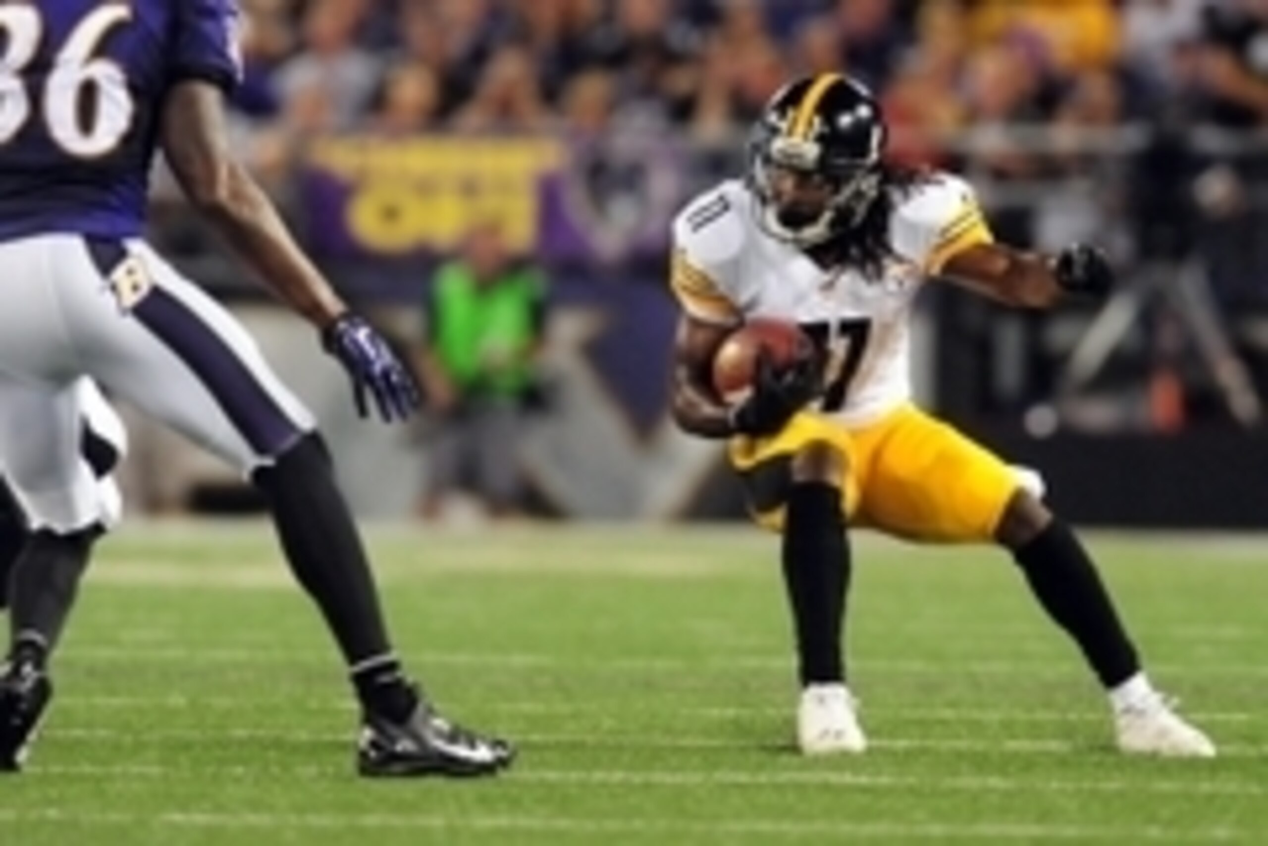 Sep 11, 2014; Baltimore, MD, USA; Pittsburgh Steelers wide receiver Markus Wheaton (11) runs with the ball against the Baltimore Ravens at M&T Bank Stadium. Mandatory Credit: Evan Habeeb-USA TODAY Sports Sep 11, 2014; Baltimore, MD, USA; Pittsburgh Steelers wide receiver Markus Wheaton (11) runs with the ball against the Baltimore Ravens at M&T Bank Stadium. Mandatory Credit: Evan Habeeb-USA TODAY Sports