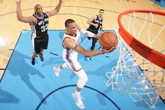 OKLAHOMA CITY, OK - May 31: Russell Westbrook #0 of the Oklahoma City Thunder shoots against the San Antonio Spurs in Game 6 of the Western Conference Finals during the 2014 NBA Playoffs at the Chesapeake Arena on May 31, 2014 in Oklahoma City, Oklahoma. 