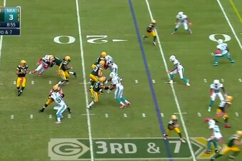 Vernon (top of picture) ran right past the tackle for the sack