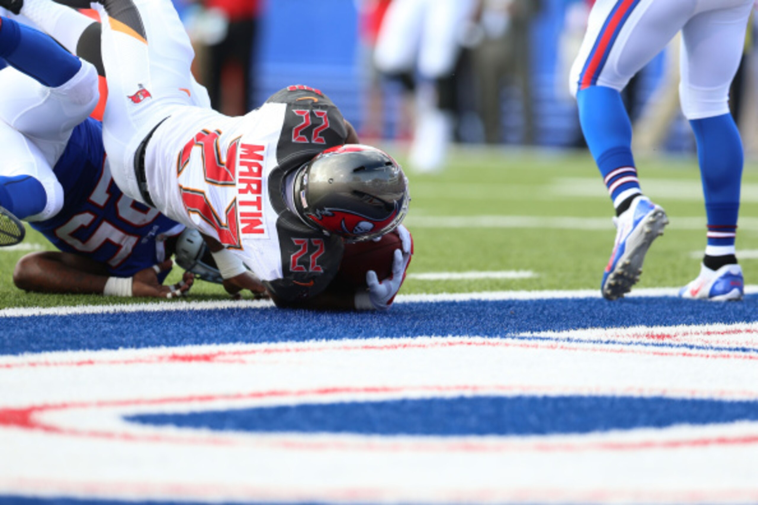 ORCHARD PARK, NY - AUGUST 23: Doug Martin #22 of the Tampa Bay Buccaneers falls into the end zone to only later have his touchdown called back as he is ruled not to have broken the plane of the endzone during the first quarter against the Buffalo Bills at ORCHARD PARK, NY - AUGUST 23: Doug Martin #22 of the Tampa Bay Buccaneers falls into the end zone to only later have his touchdown called back as he is ruled not to have broken the plane of the endzone during the first quarter against the Buffalo Bills at
