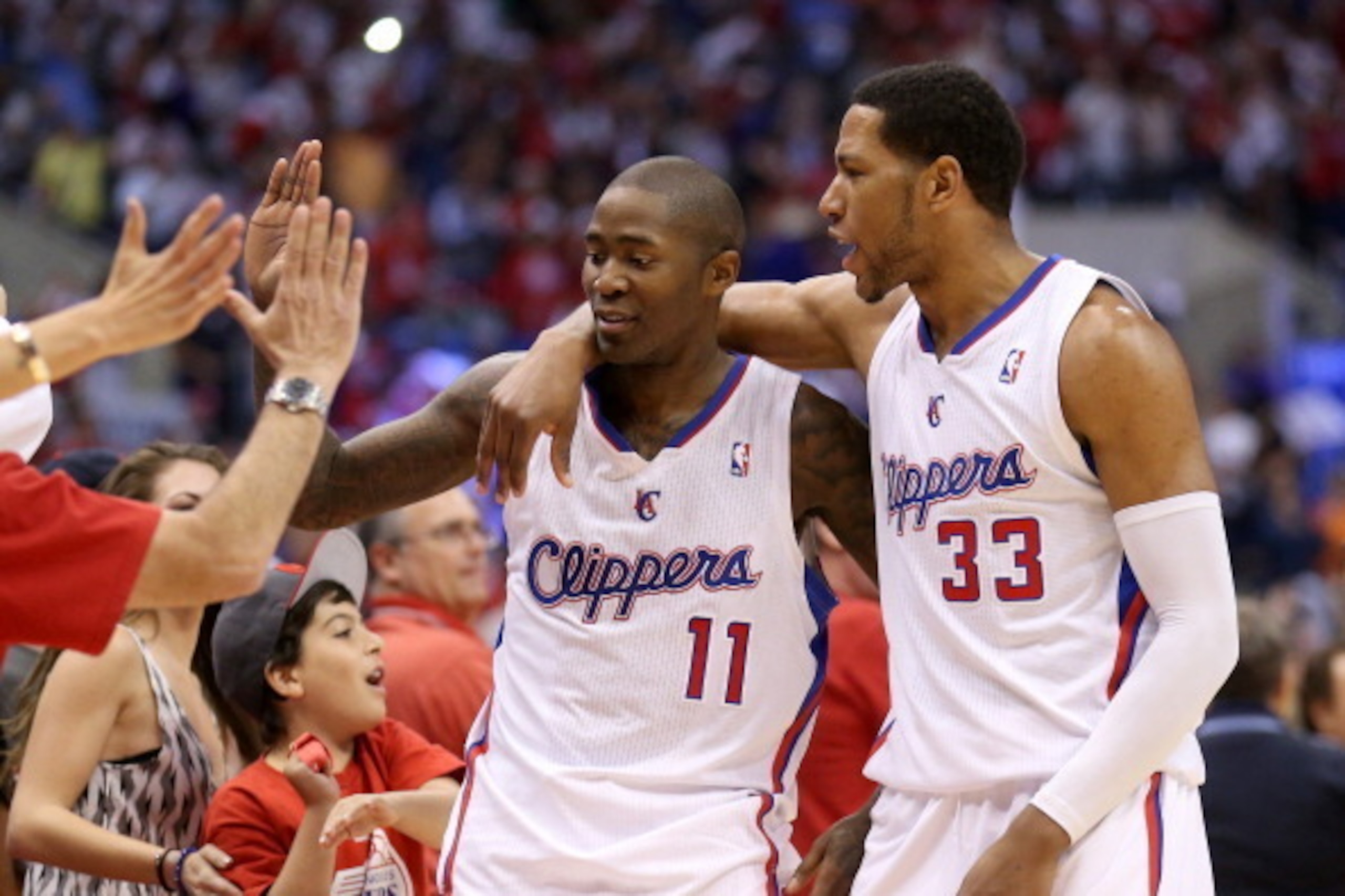 LOS ANGELES, CA - MAY 11:  Jamal Crawford #11 and Danny Granger #33 of the Los Angeles Clippers celebrate the fans after defeating the Oklahoma City Thunder in Game Four of the Western Conference Semifinals during the 2014 NBA Playoffs at Staples Center o