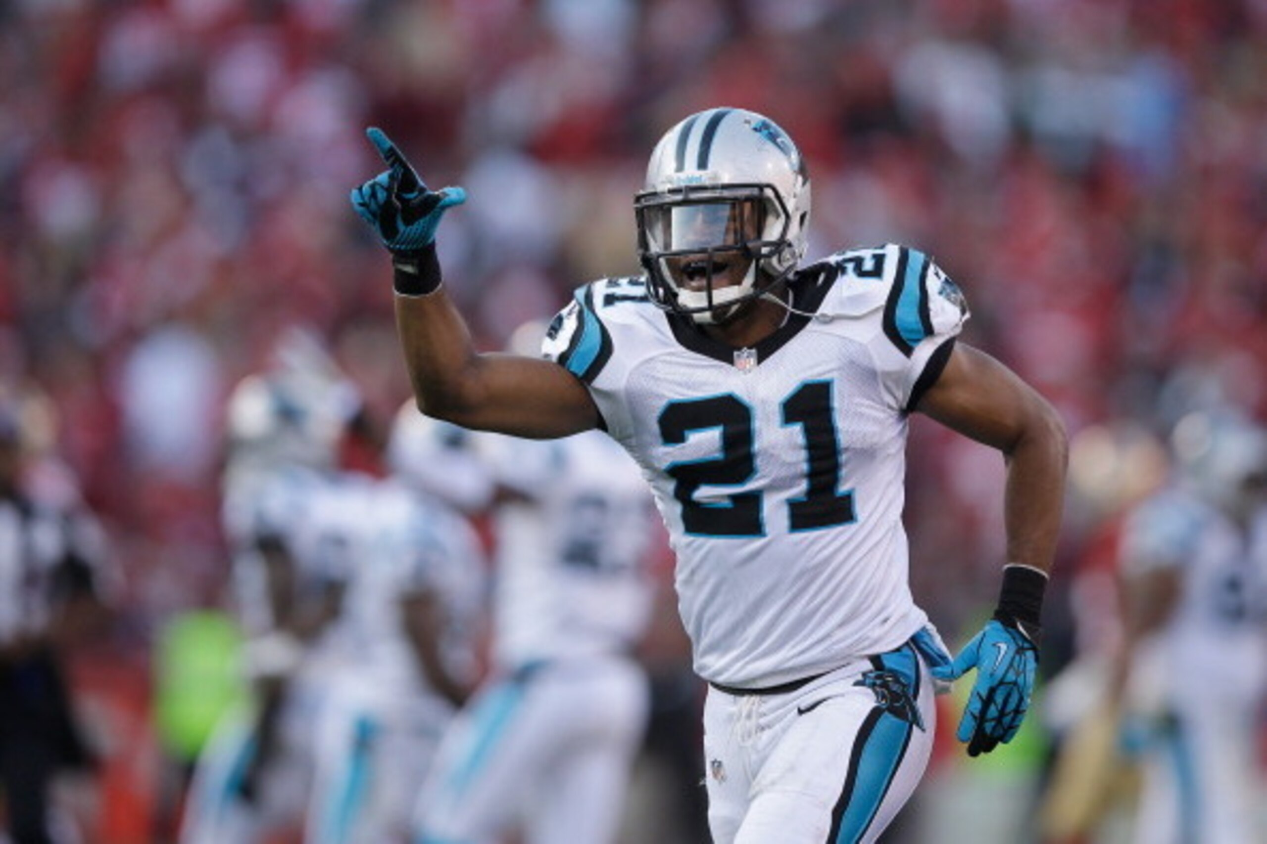 SAN FRANCISCO, CA - NOVEMBER 10:  Mike Mitchell #21 of the Carolina Panthers celebrates after the Panthers intercepted the ball late in the fourth quarter of their game against the San Francisco 49ers at Candlestick Park on November 10, 2013 in San Franci