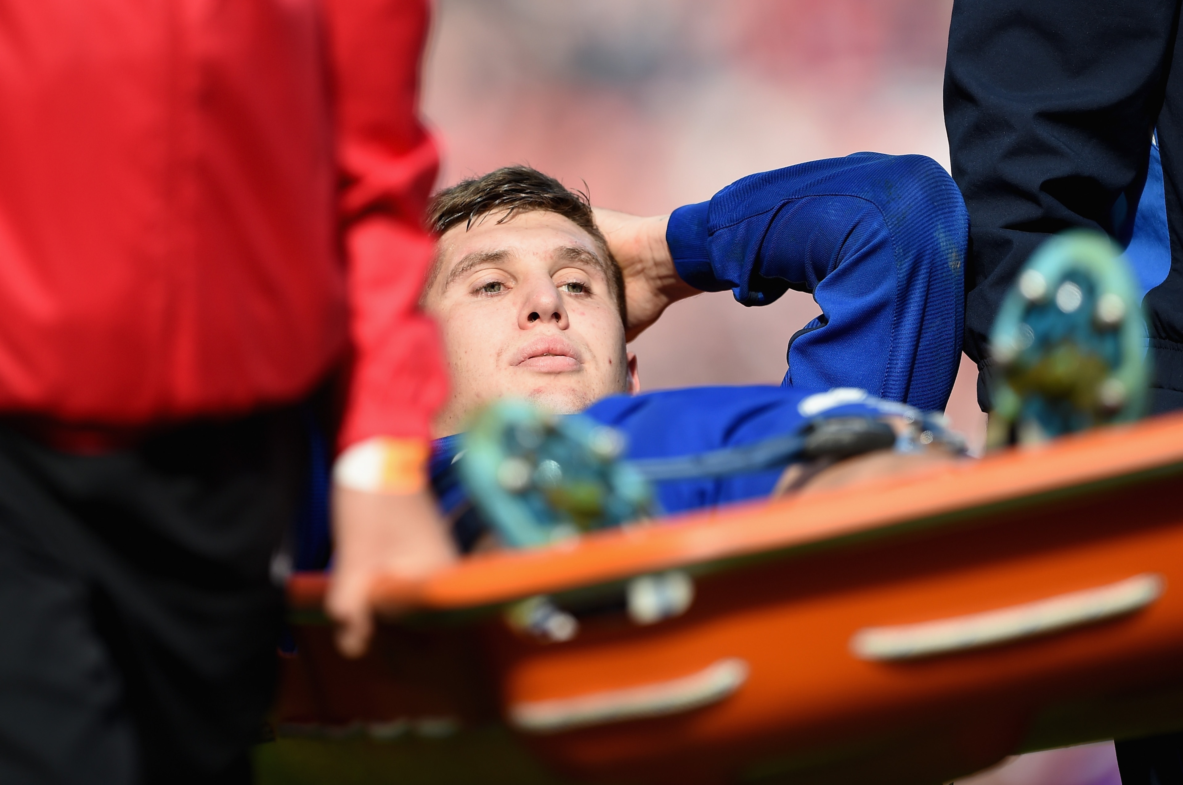 MANCHESTER, ENGLAND - OCTOBER 05:  John Stones of Everton is stretchered off during the Barclays Premier League match between Manchester United and Everton at Old Trafford on October 5, 2014 in Manchester, England.  (Photo by Michael Regan/Getty Images)