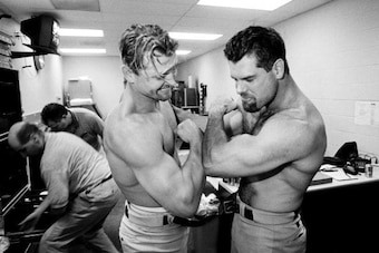 Ken Caminiti, right, and Trevor Hoffman compare biceps.
