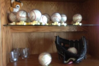 This Ken Caminiti memorabilia is on display in his parents' house.