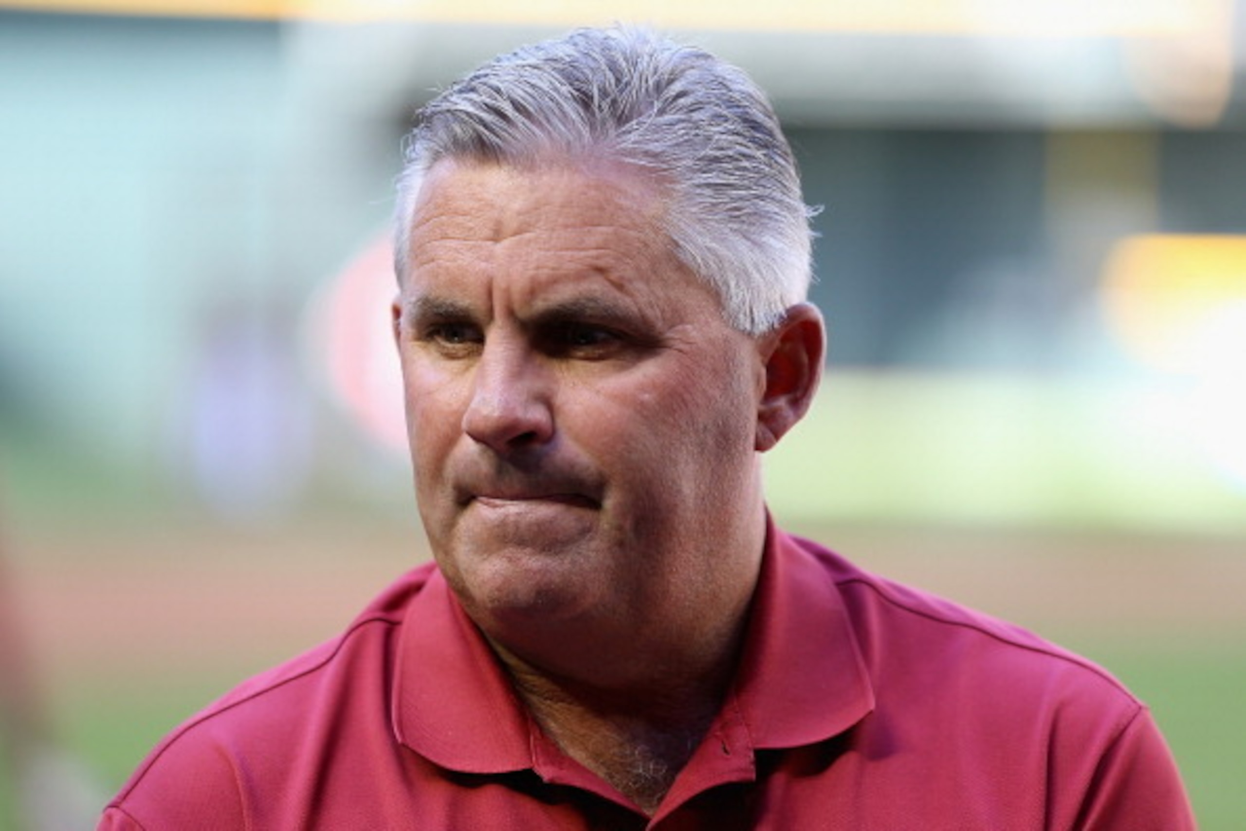 PHOENIX, AZ - MARCH 31:  General manager Kevin Towers of the Arizona Diamondbacks talks with the media before the Opening Day MLB game against the San Francisco Giants at Chase Field on March 31, 2014 in Phoenix, Arizona.  (Photo by Christian Petersen/Get