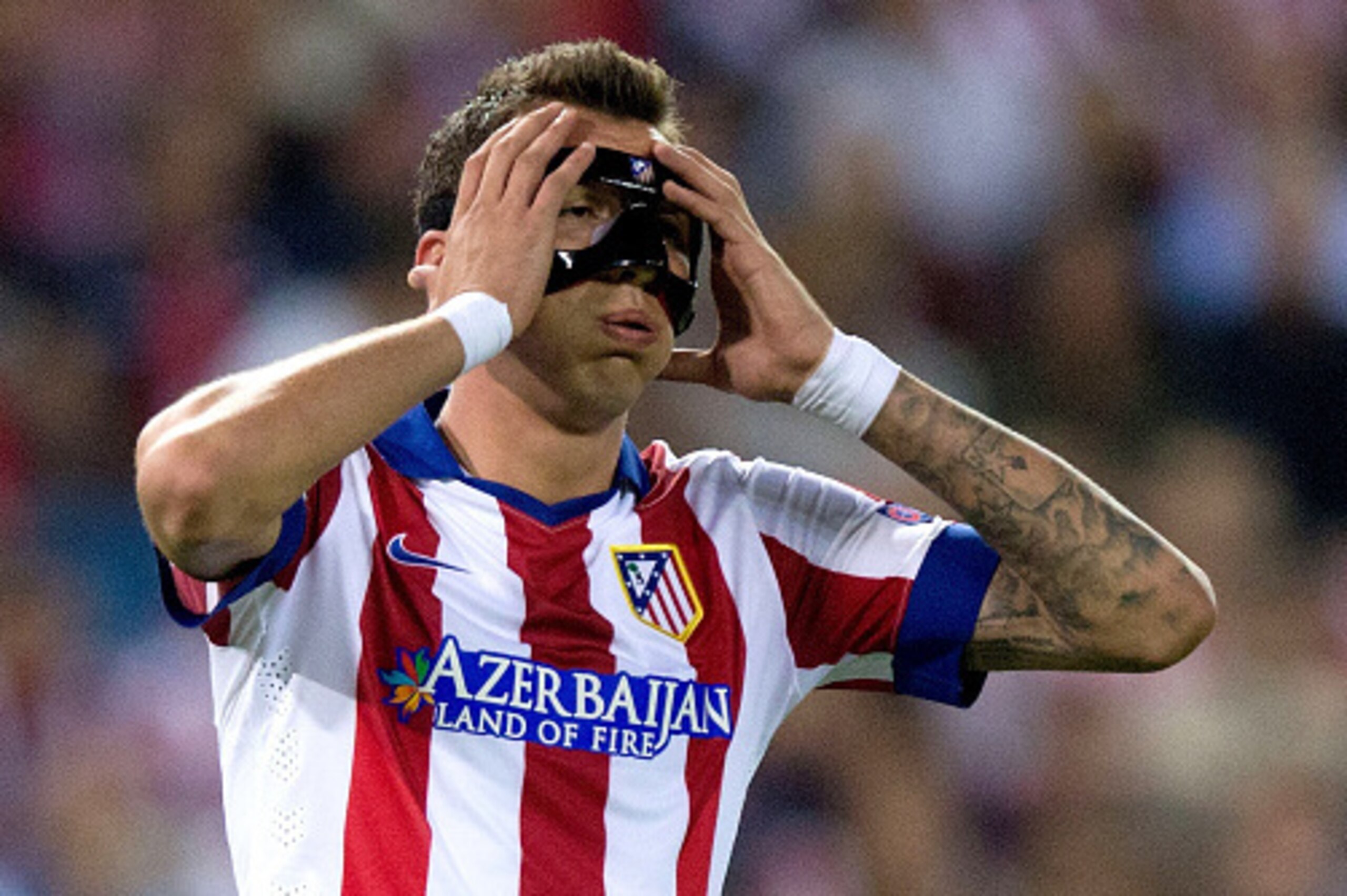 MADRID, SPAIN - OCTOBER 01: Mario Mandzukic of Atletico de Madrid reacts during the UEFA Champions League group A match between Club Atletico de Madrid and Juventus at Vievnte Calderon Stadium on October 1, 2014 in Madrid, Spain. (Photo by Gonzalo Arroyo MADRID, SPAIN - OCTOBER 01: Mario Mandzukic of Atletico de Madrid reacts during the UEFA Champions League group A match between Club Atletico de Madrid and Juventus at Vievnte Calderon Stadium on October 1, 2014 in Madrid, Spain. (Photo by Gonzalo Arroyo
