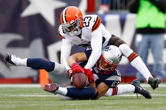 FOXBORO, MA - DECEMBER 08: Joe Haden #23 of the Cleveland Browns defends a pass in front of Julian Edelman #11 of the New England Patriots in the second half during the game at Gillette Stadium on December 8, 2013 in Foxboro, Massachusetts.  (Photo by Jar